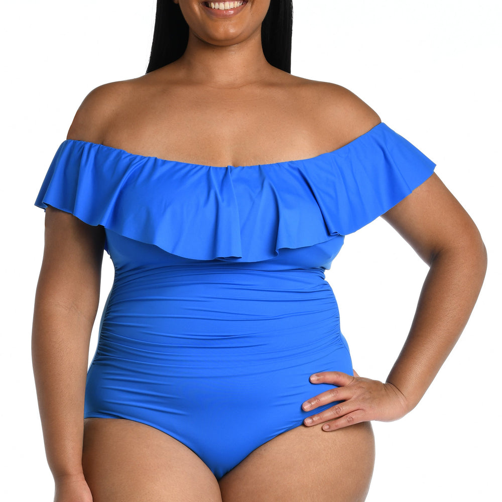 
                  
                    Model is wearing a capri blue colored one piece swimsuit from our Best-Selling Island Goddess collection.
                  
                