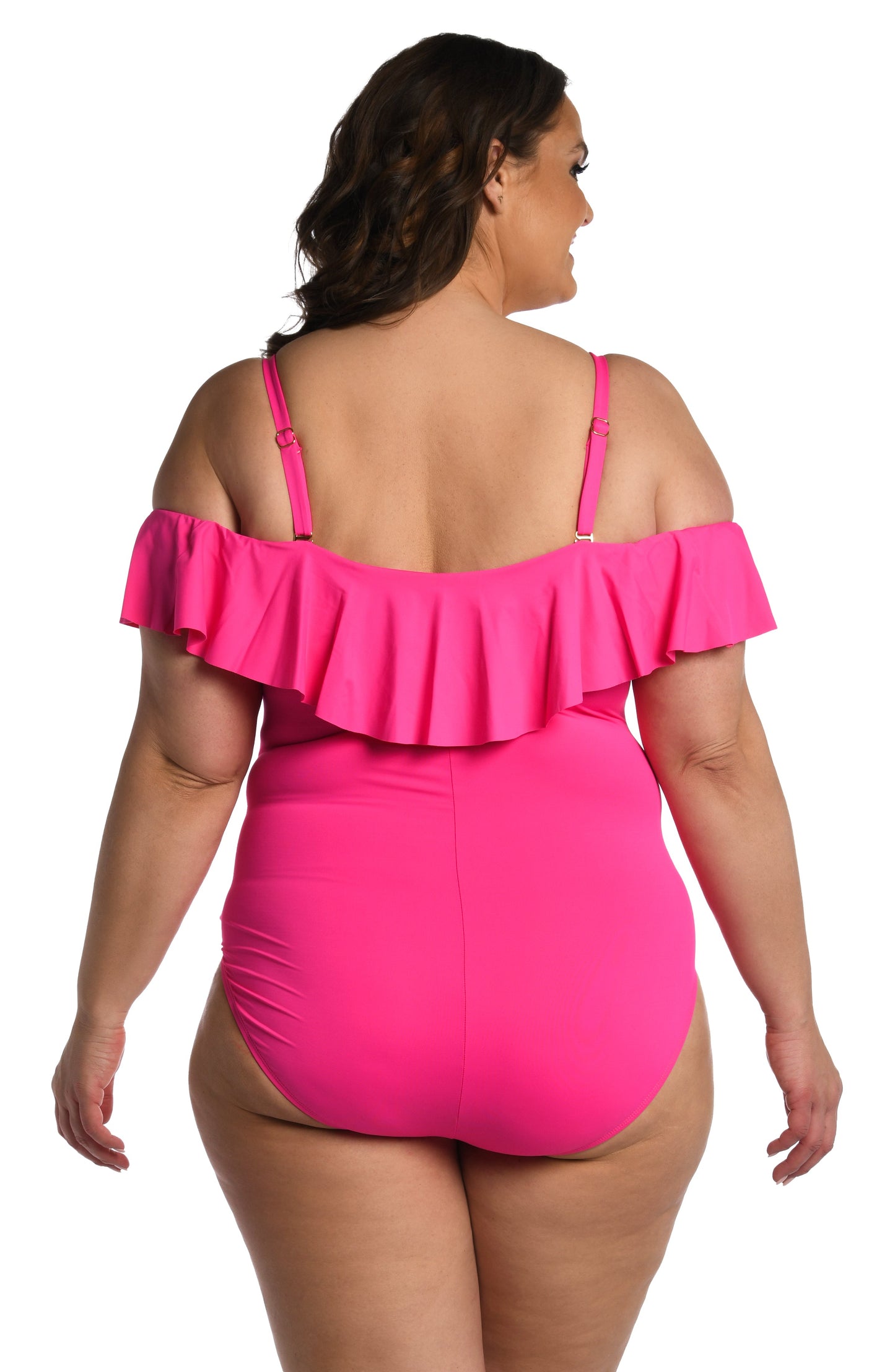 Model is wearing a pop pink colored one piece swimsuit from our Best-Selling Island Goddess collection.