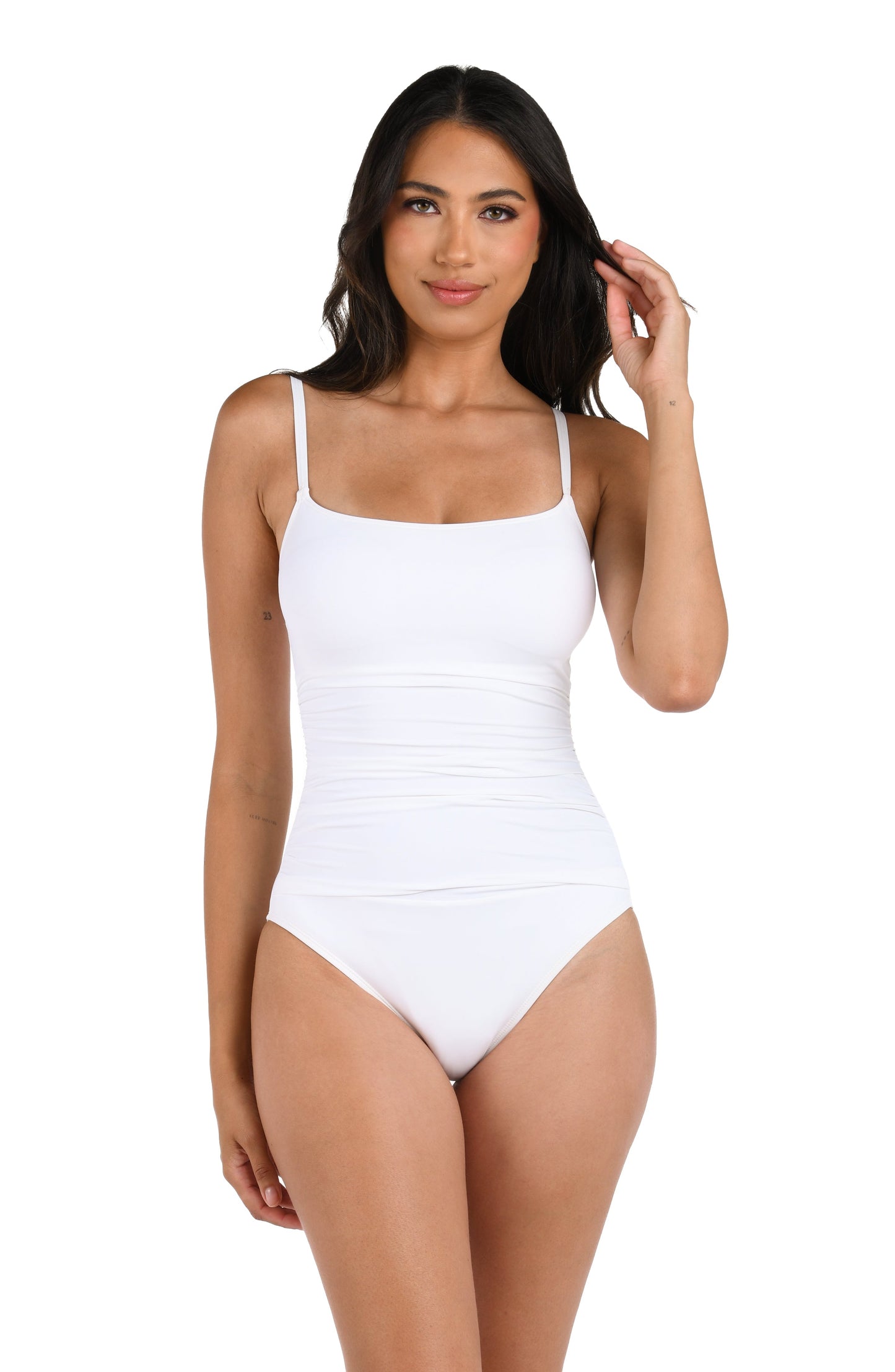 Model is wearing a white one piece swimsuit from our Best-Selling Island Goddess collection.