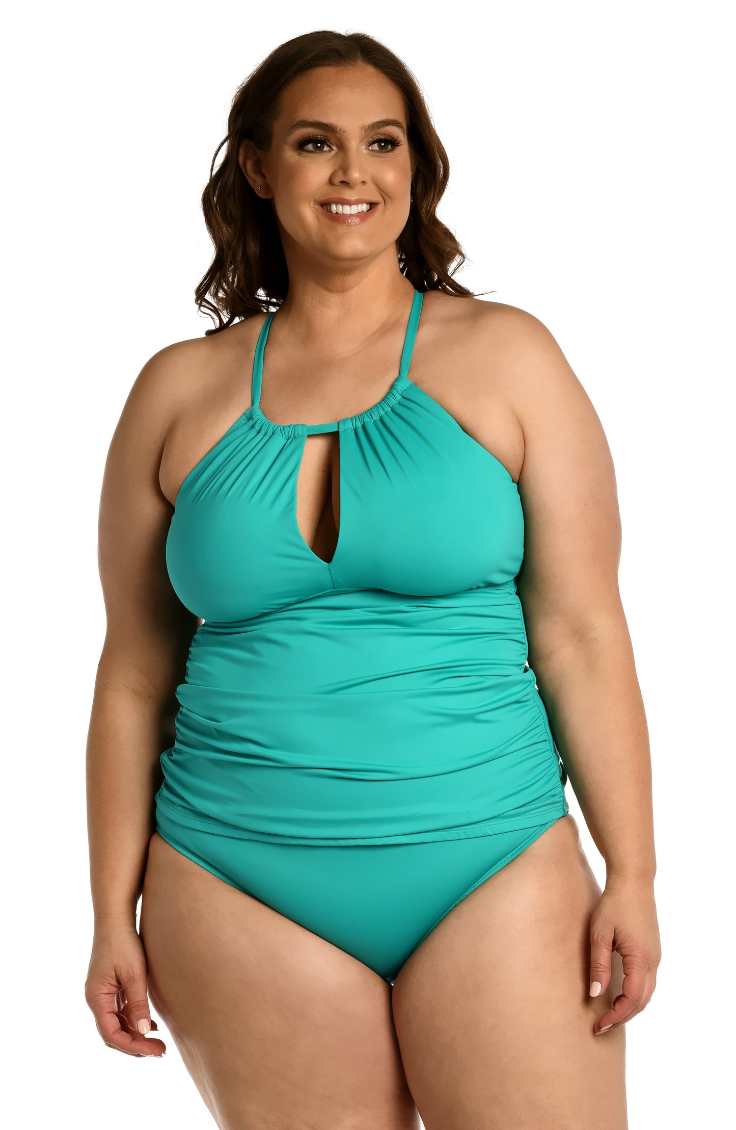 Model is wearing a emerald colored keyhole tankini swimsuit top from our Best-Selling Island Goddess collection.