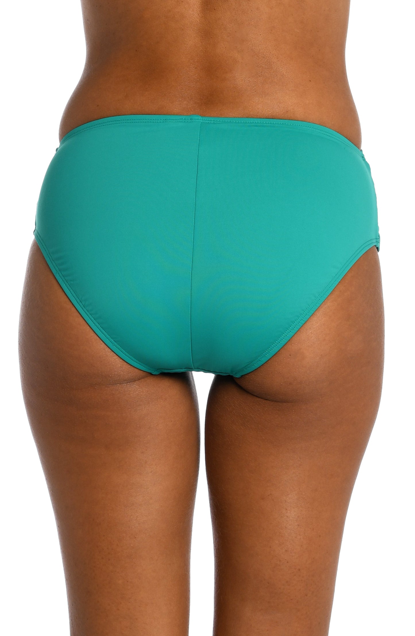 Model is wearing a emerald colored mid-waist swimsuit bottom from our Best-Selling Island Goddess collection.