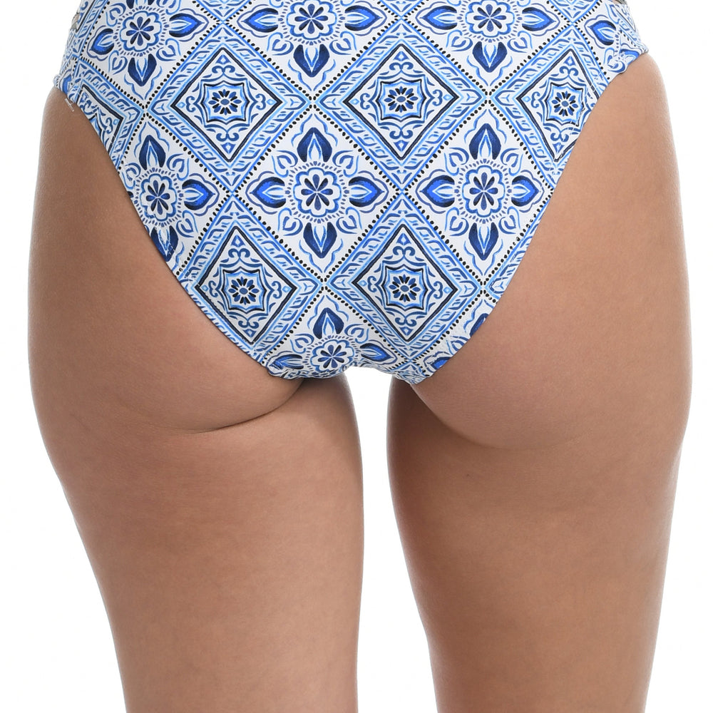 Model is wearing a light blue artful mosaic printed side shirred swimsuit bottom from our Mediterranean Breeze collection.