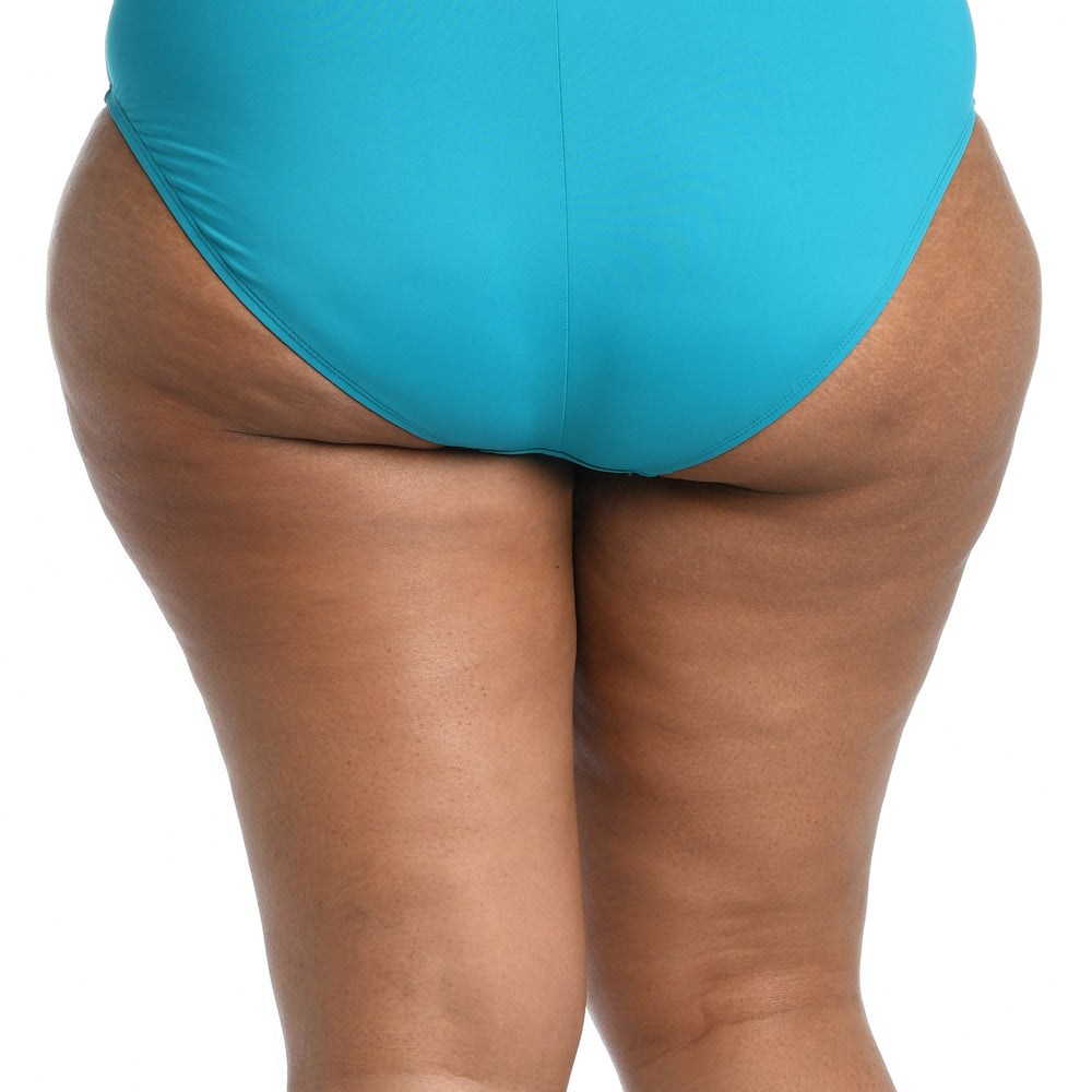 Model is wearing a turquoise colored high waist swimsuit bottom from our Best-Selling Island Goddess collection.