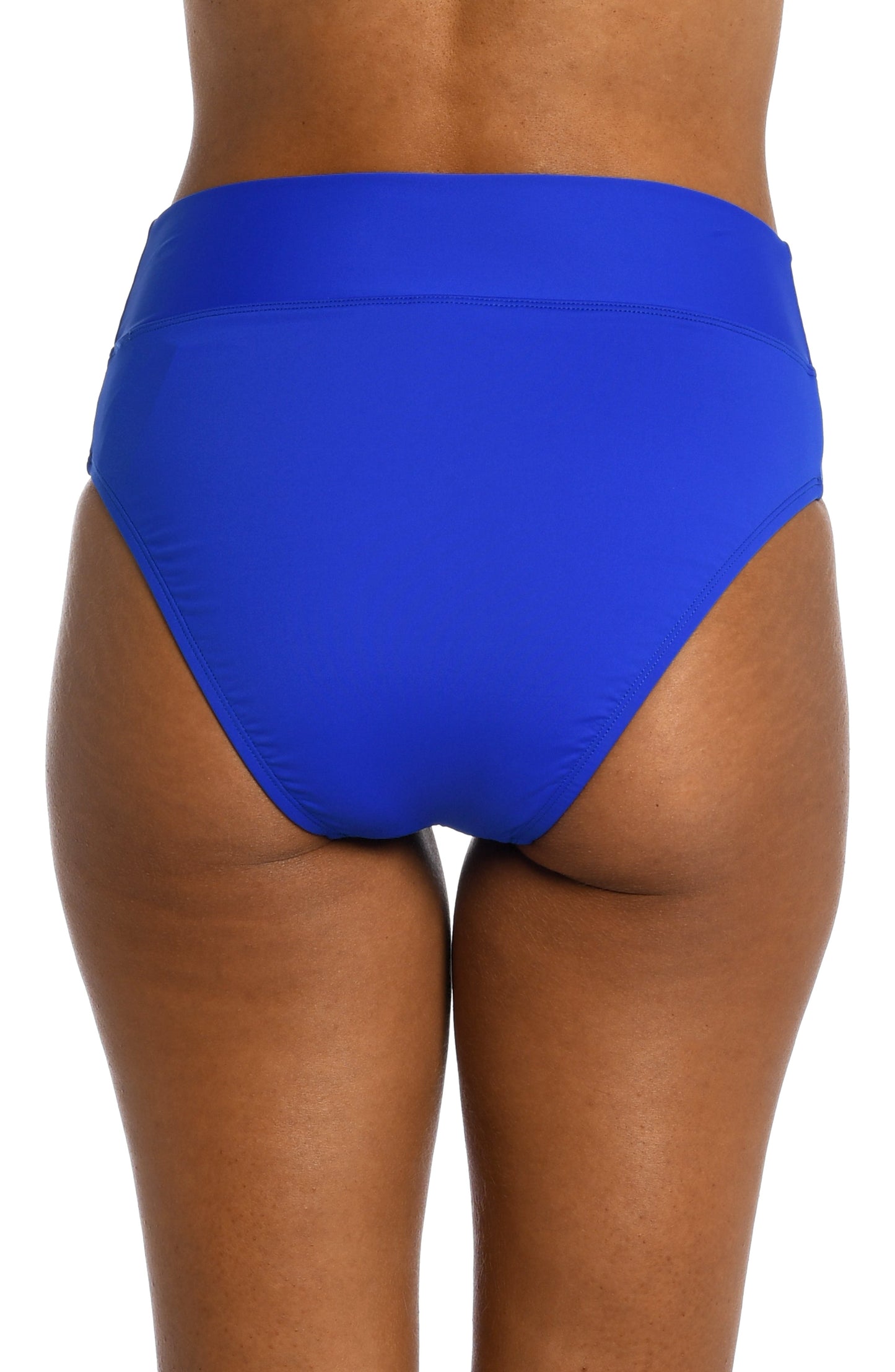 Model is wearing a sapphire colored high waist swimsuit bottom from our Best-Selling Island Goddess collection.