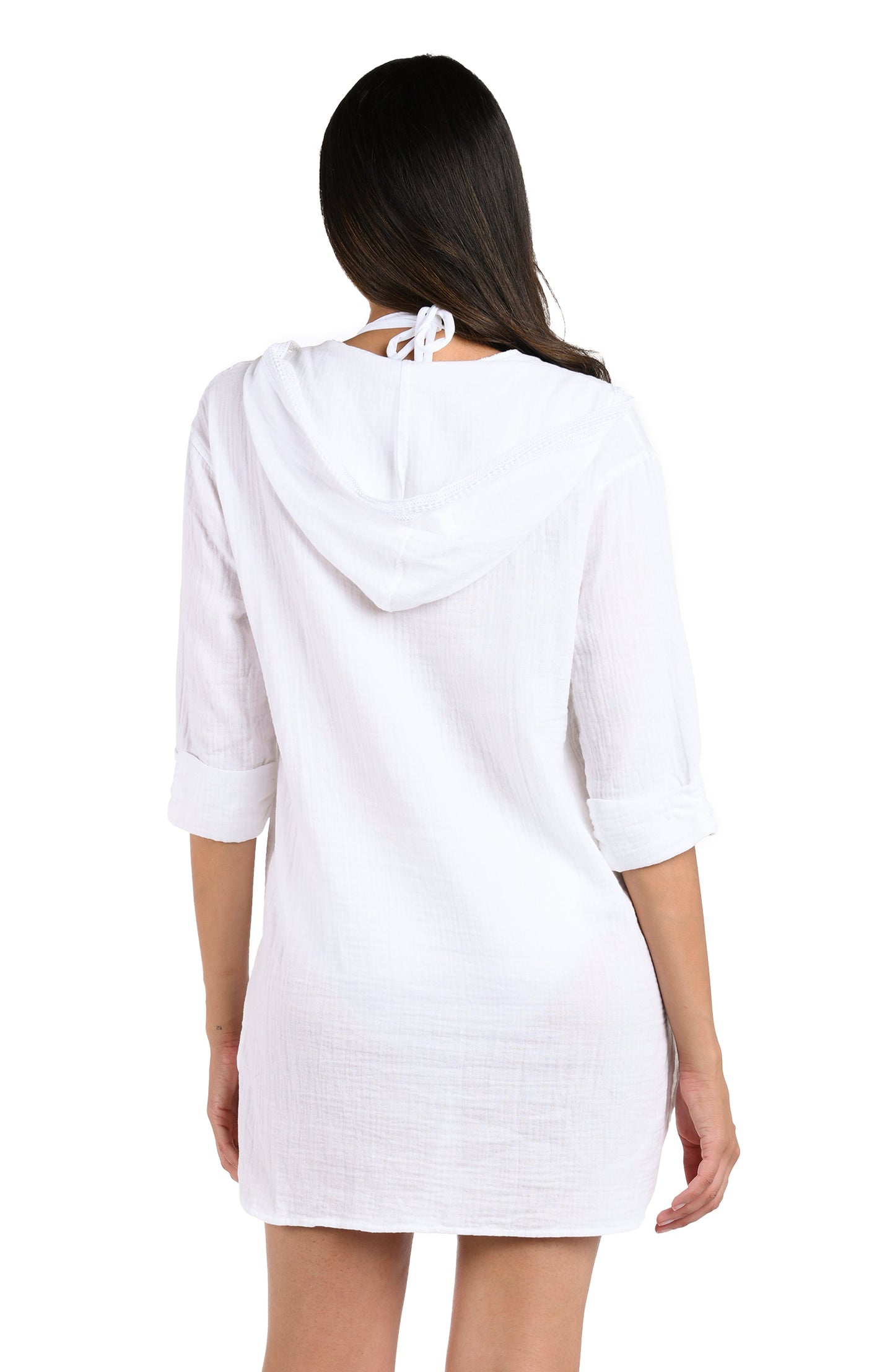 Model is wearing a white hooded cover up from our Seaside Covers collection!