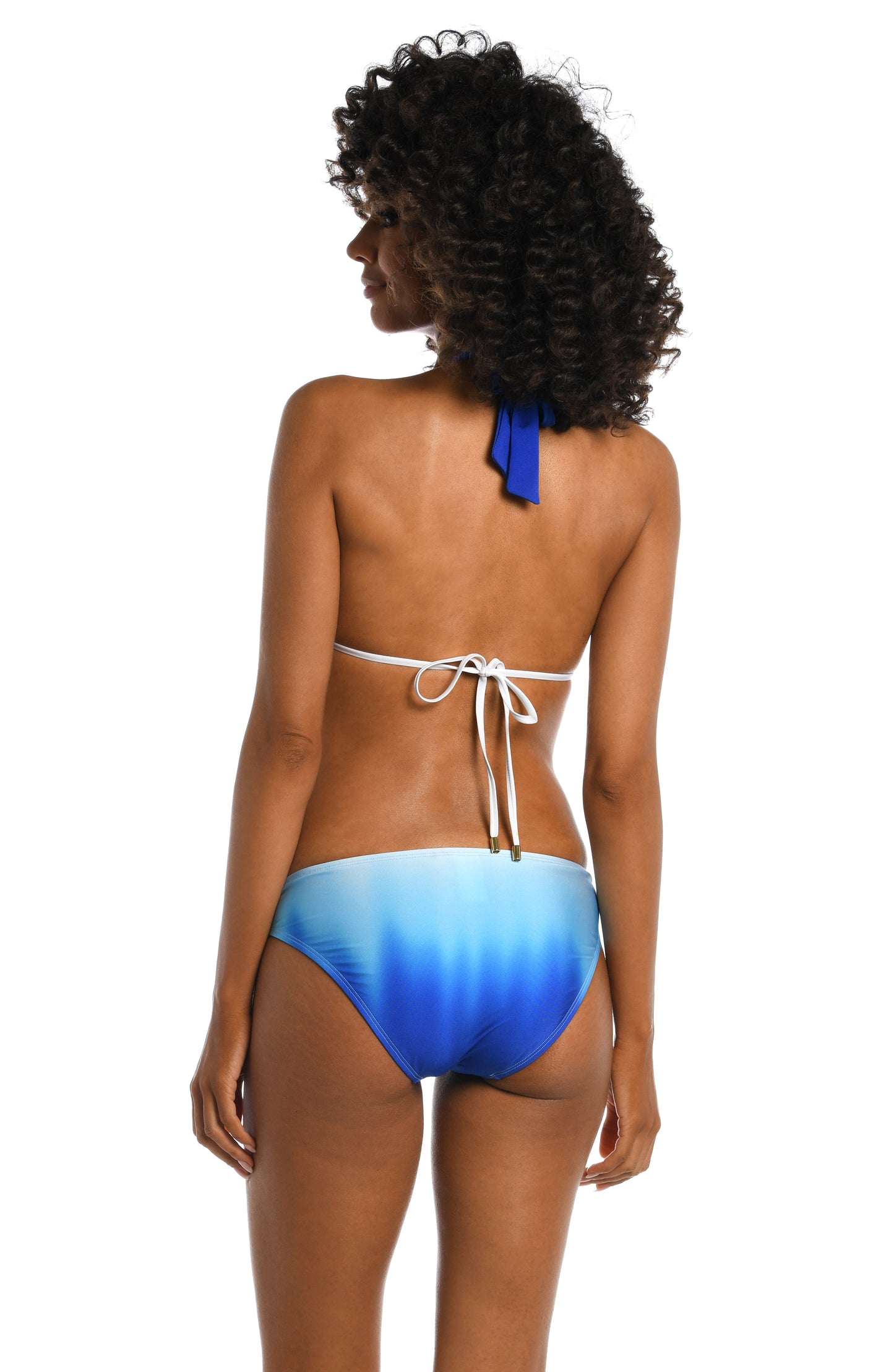 Model is wearing a sapphire colored ombre printed halter top from our Ocean Oasis collection!