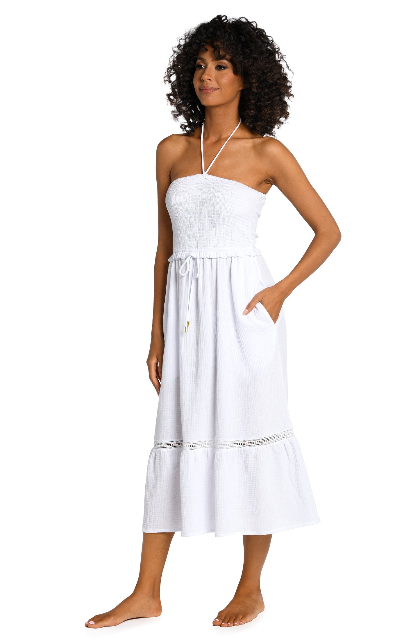 Model is wearing a white midi dress cover up from our Seaside Covers collection!