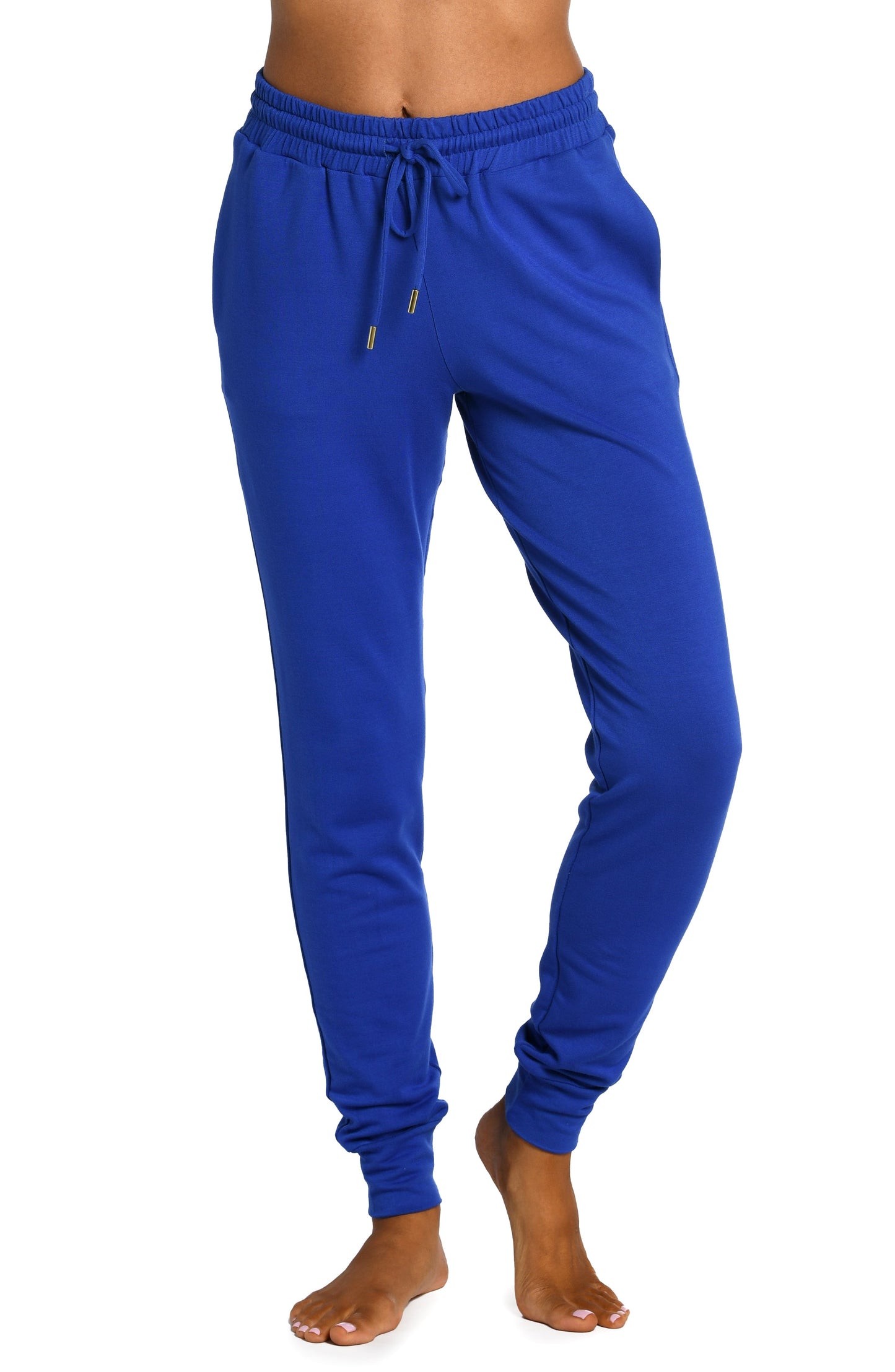 Model is wearing a sapphire colored knitted joggers from our Living in Leisure collection!