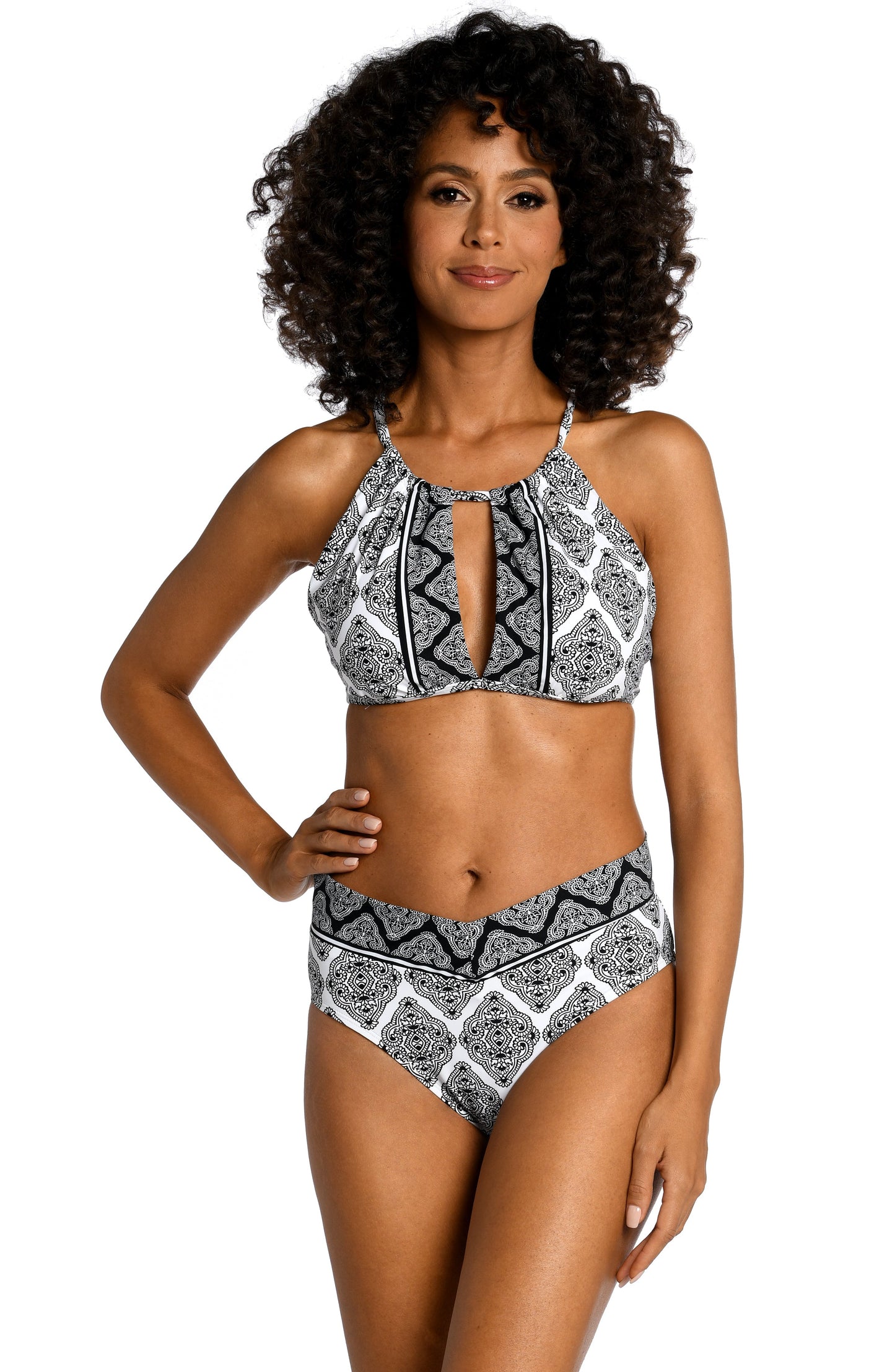 Model is wearing a black and white geometric printed high neck midkini top from our Oasis Tile collection!