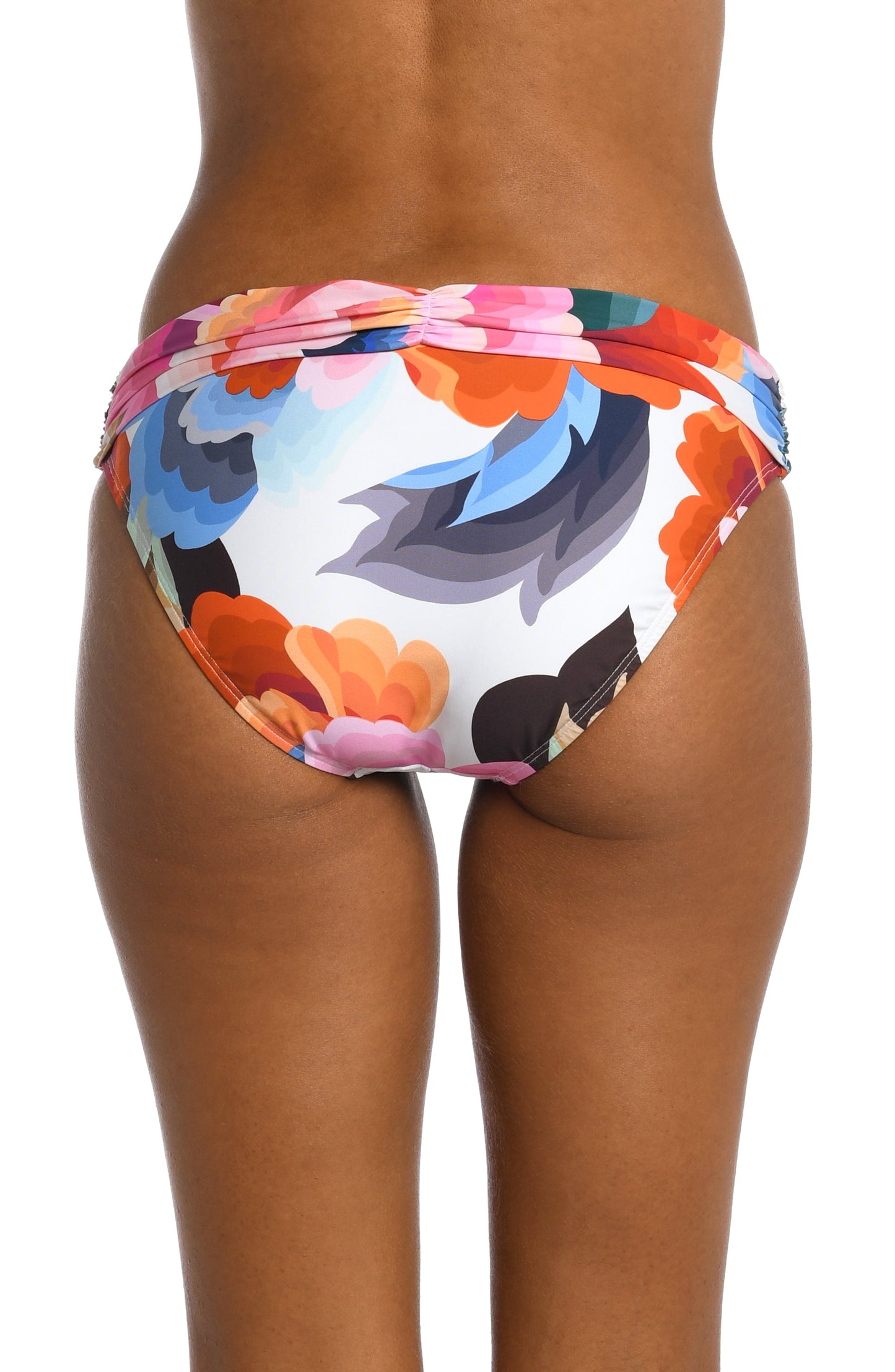 Model is wearing a multi colored floral printed shirred hipster bottom from our Floral Rhythm collection!