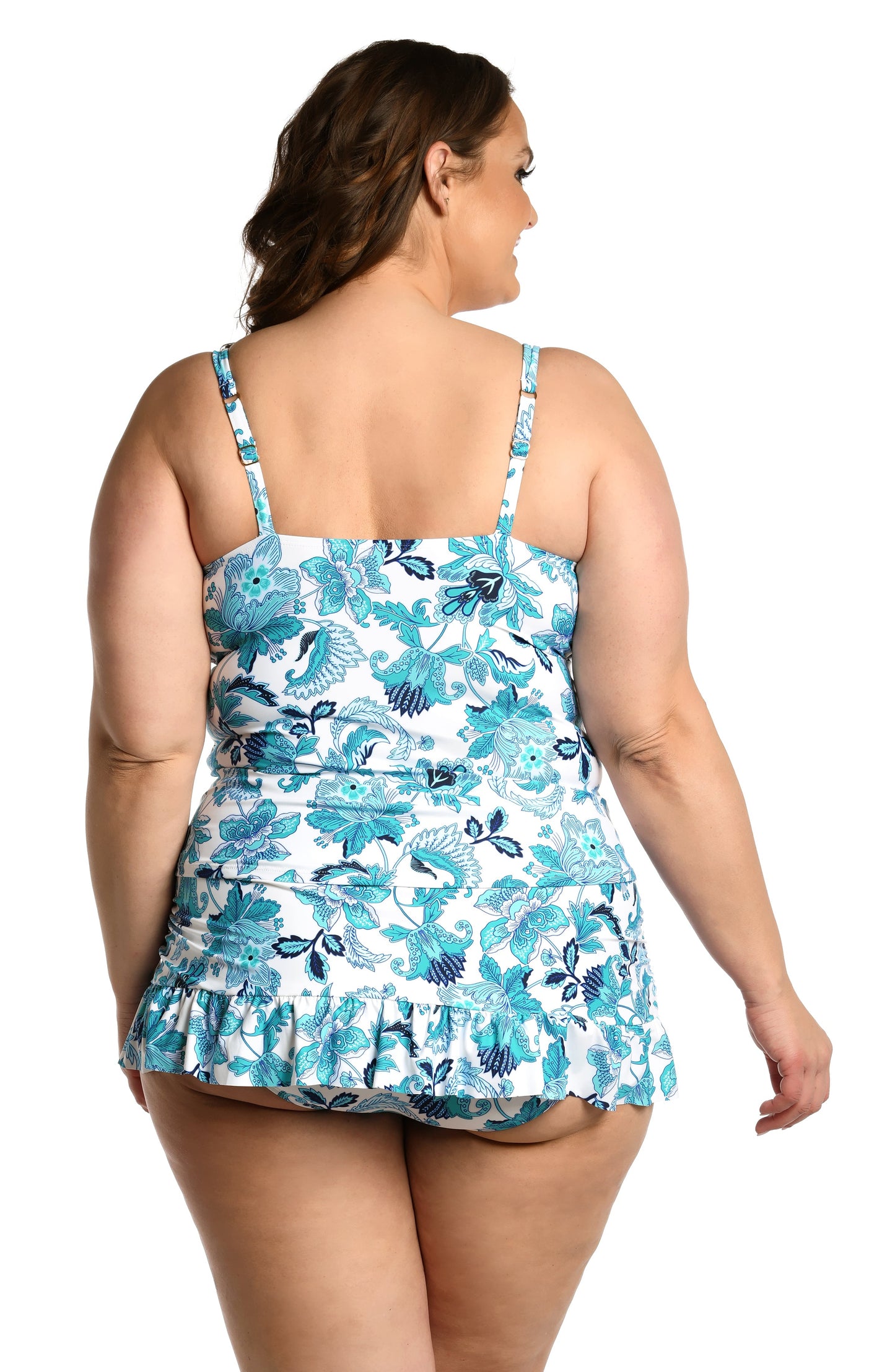 Model is wearing a light blue multi colored mediterranean printed halter tankini top from our Santorini Sun collection!