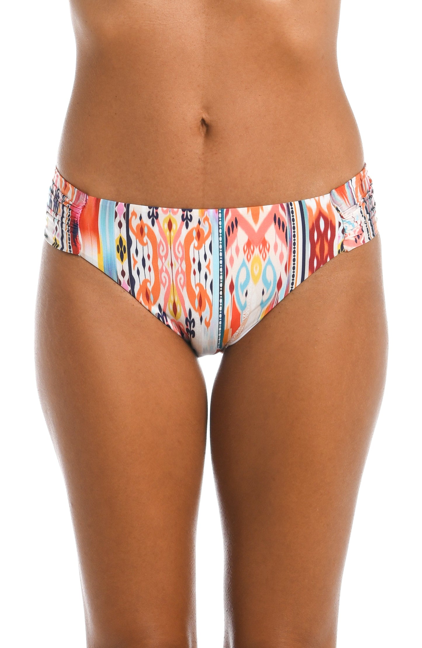 Model is wearing a multi colored tribal printed side tie hipster bottom from our Desert Dream collection!