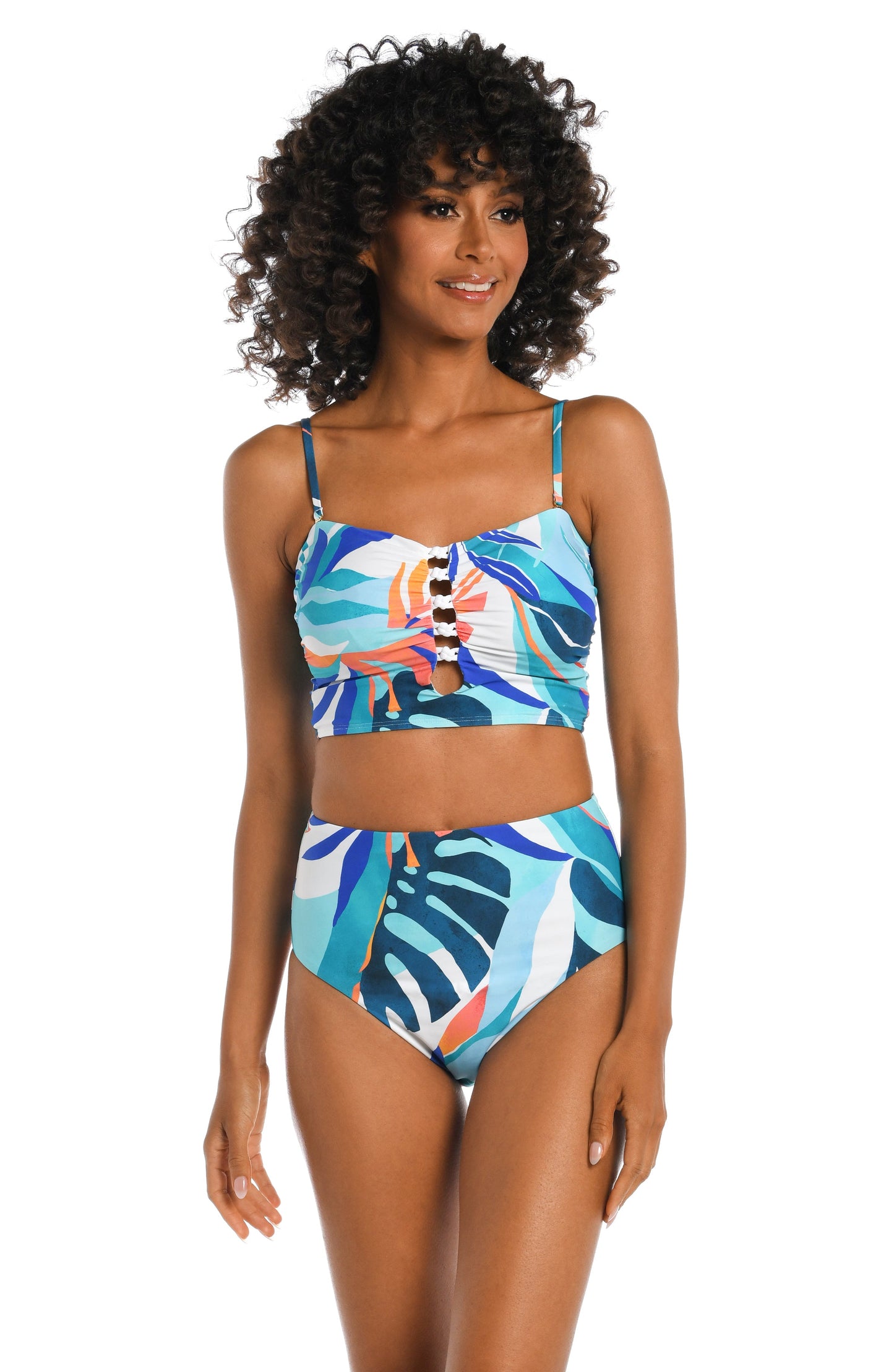 Model is wearing a blue multi colored tropical printed midkini top from our Coastal Palms collection!