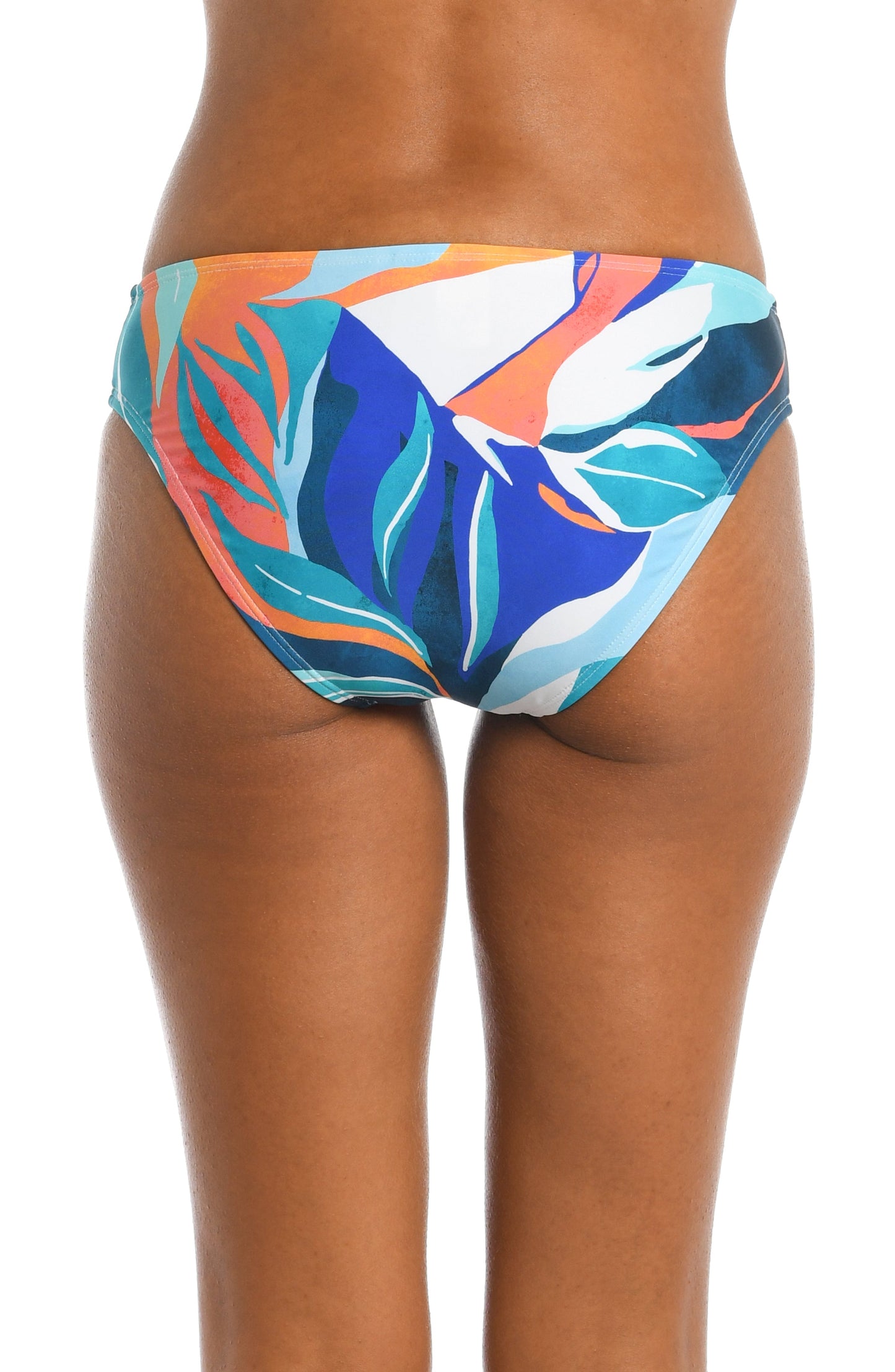 Model is wearing a blue multi colored tropical printed hipster bottom from our Coastal Palms collection!