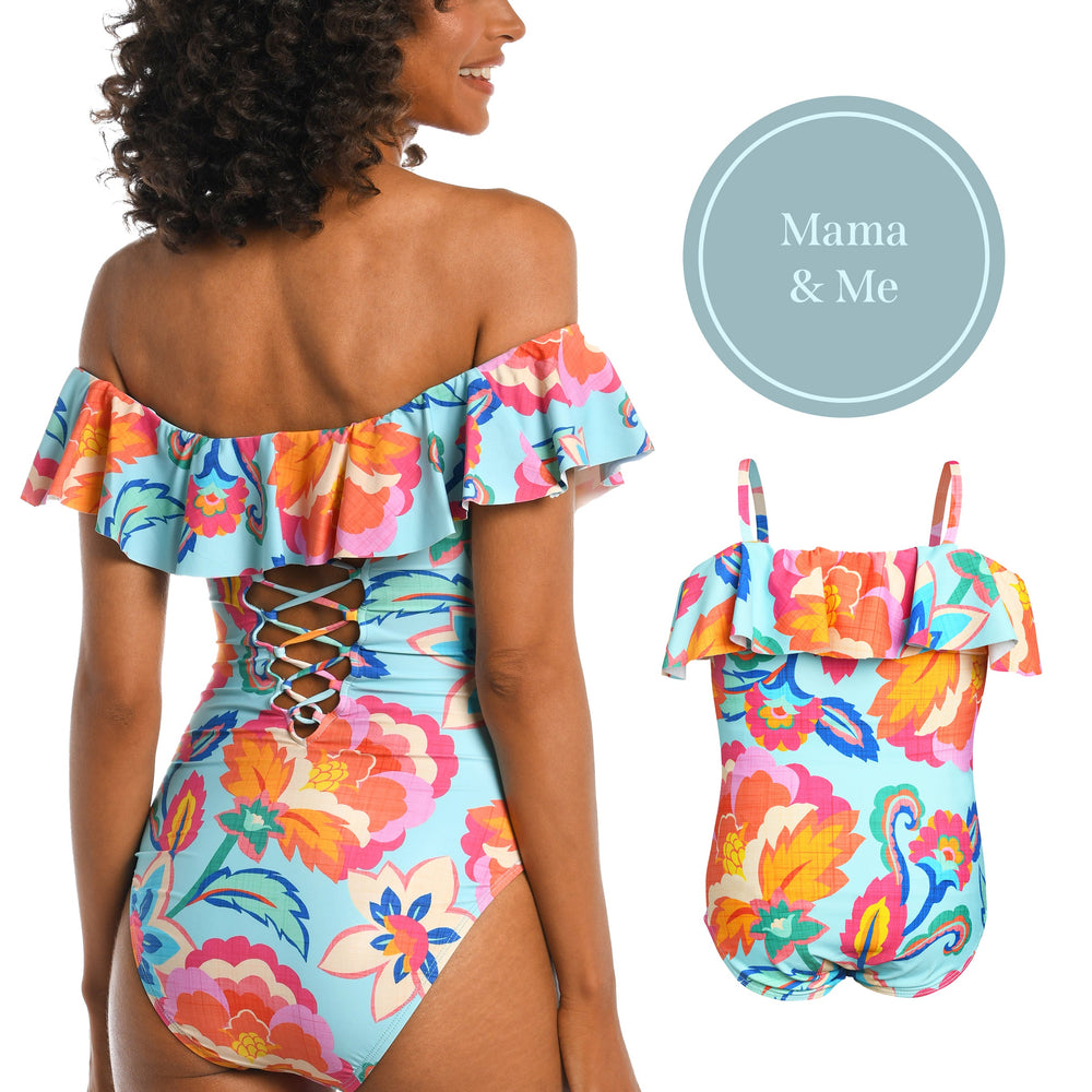 
                  
                    Model is wearing a light blue multi colored tropical printed off shoulder one piece from our Breezy Beauty collection!
                  
                