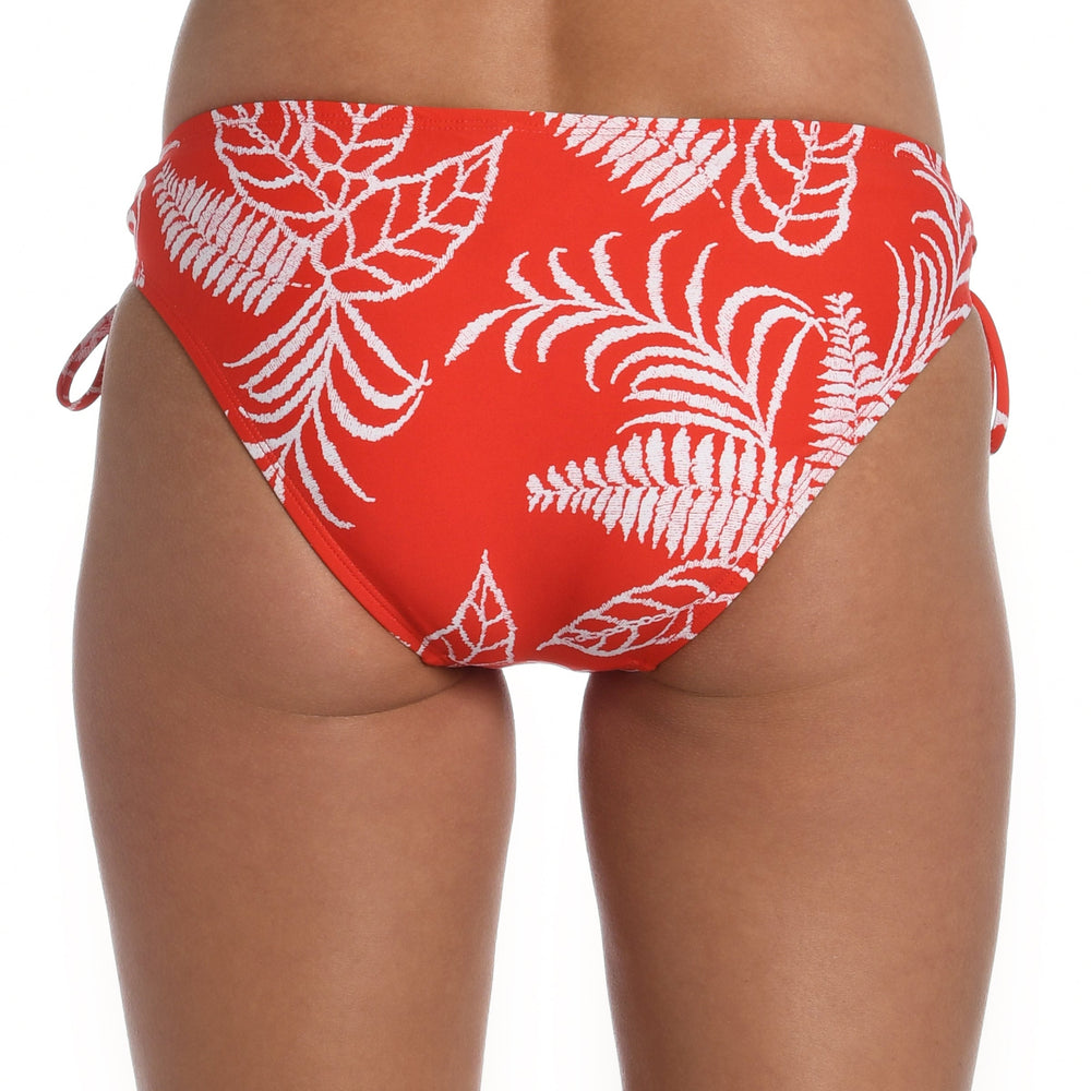 Model is wearing cherry red tropical printed side tie hipster bottom from our Tropical Tapestry collection!