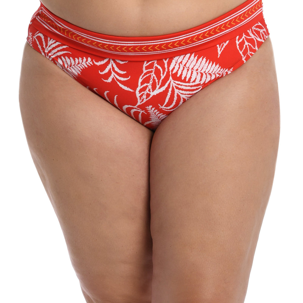 Model is wearing cherry red tropical printed side shirred hipster bottom from our Tropical Tapestry collection!