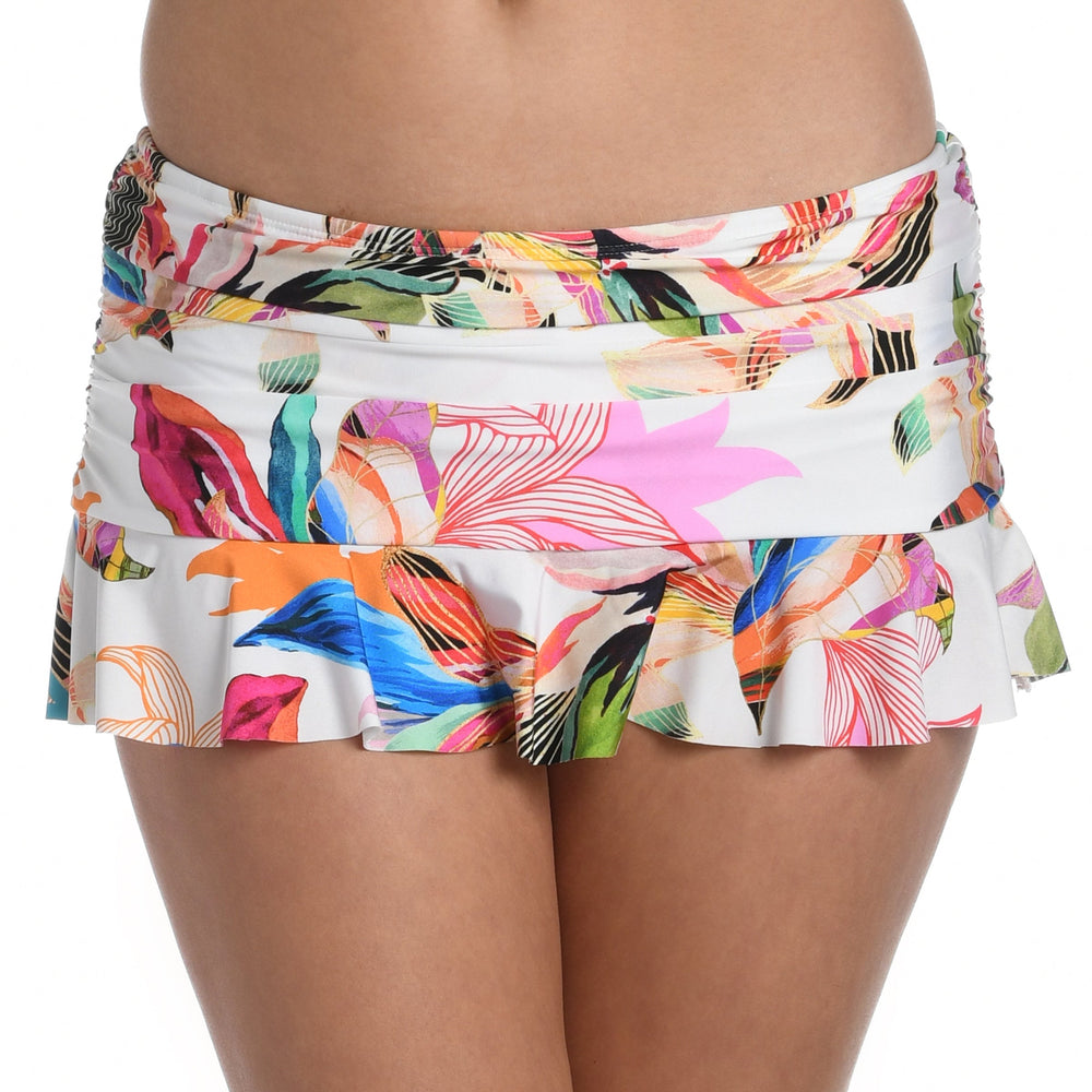 Model is wearing a multi colored tropical printed ruffle skirted bottom from our Paradise City collection!