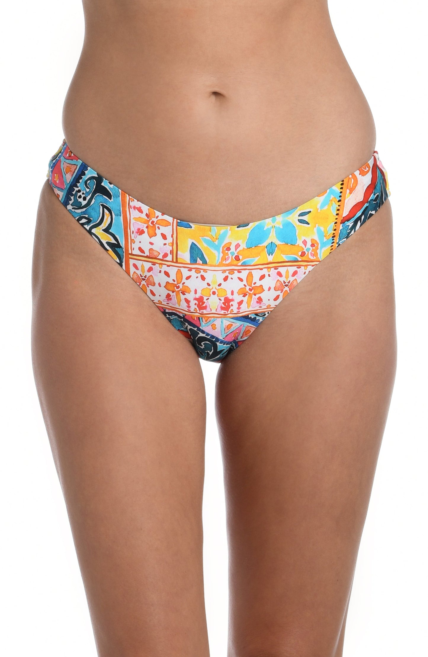 Model is wearing a moroccan inspired multi colored printed hipster bottom from our Soleil collection!