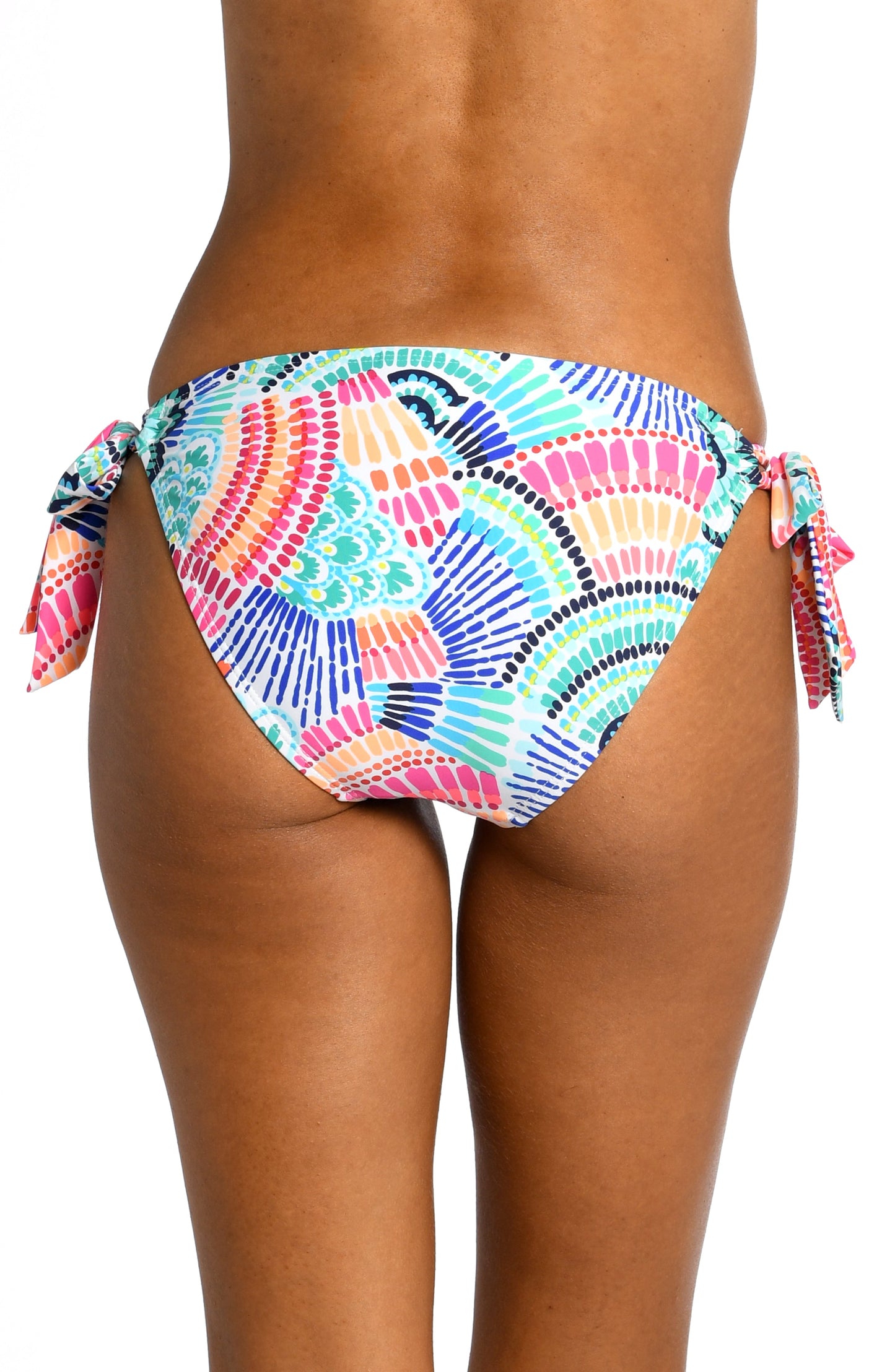 Model is wearing a multi colored geometric printed side tie hipster bottom from our Waves of Color collection!