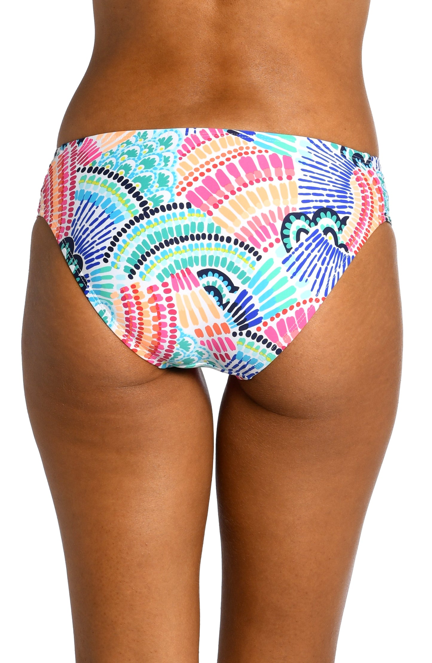 Model is wearing a multi colored geometric printed side shirred hipster bottom from our Waves of Color collection!