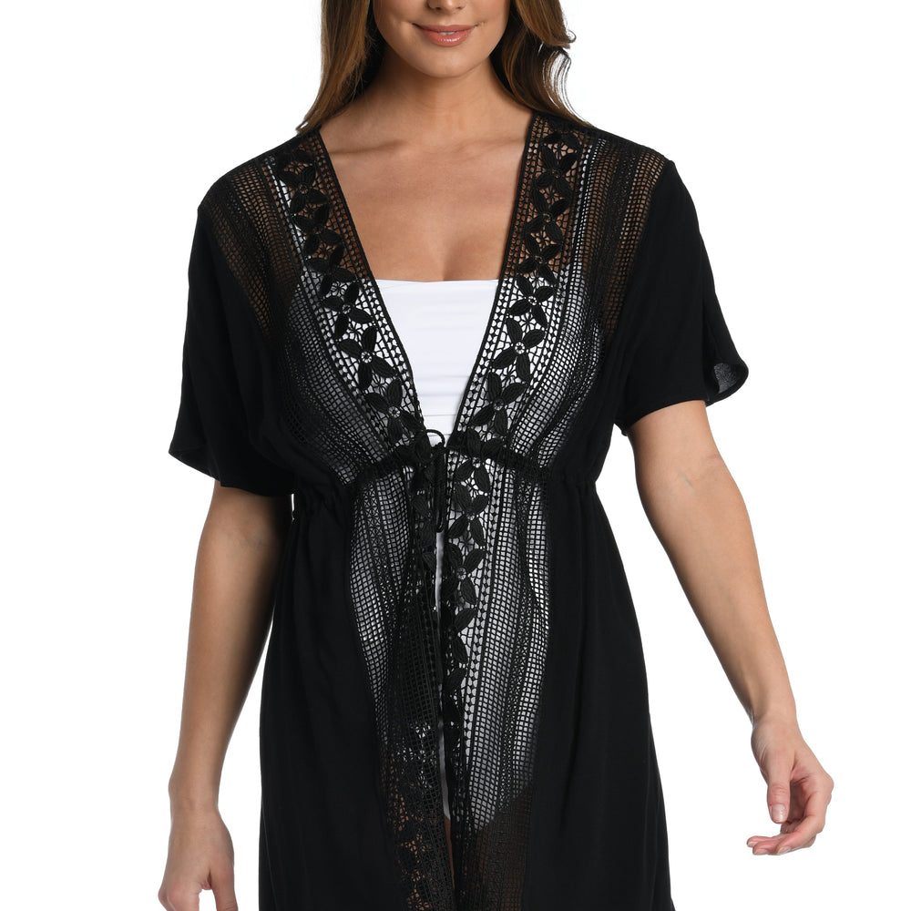 Model is wearing a crochet detailed pattern on this black kimono cover up from out Coastal Covers collection!