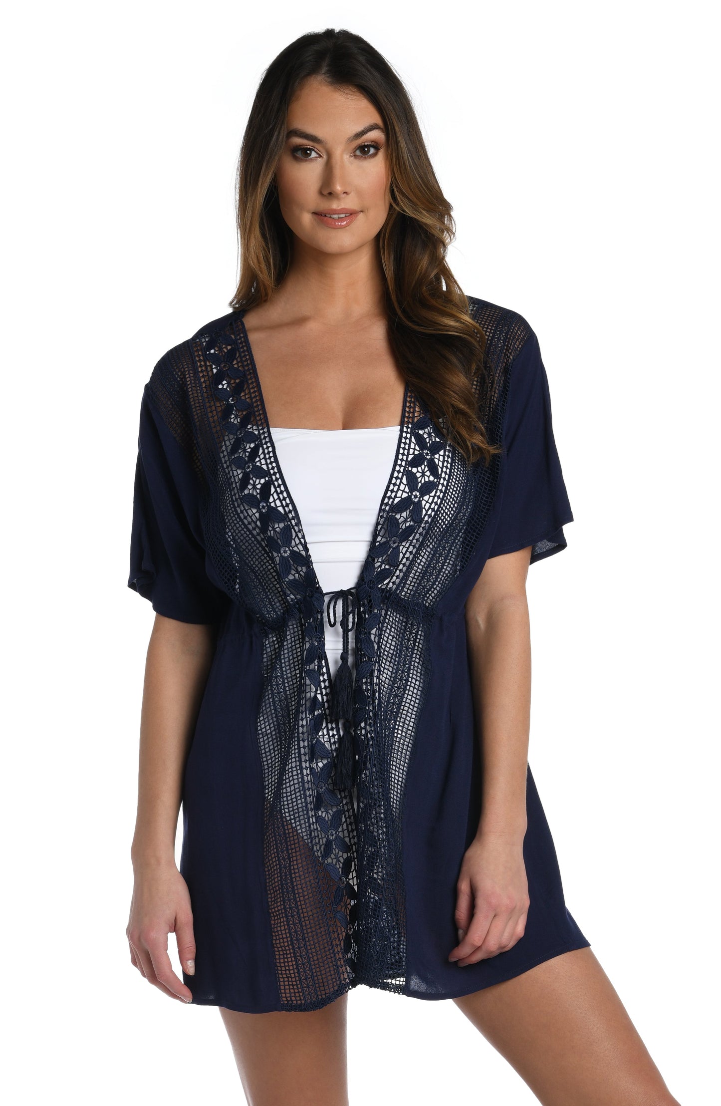 Model is wearing a crochet detailed pattern on this indigo kimono cover up from out Coastal Covers collection!