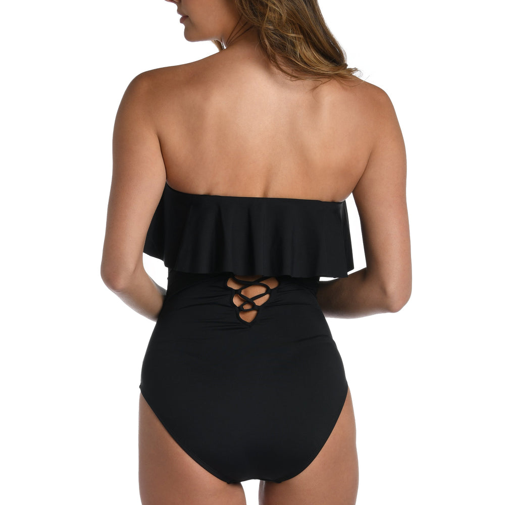 
                  
                    Model is wearing a black one piece swimsuit from our Best-Selling Island Goddess collection.
                  
                