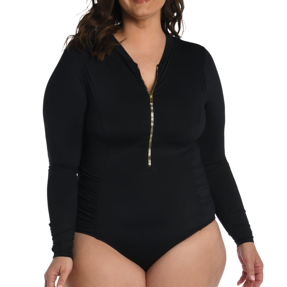 
                  
                    Model is wearing a black paddle suit one piece from our Best-Selling Island Goddess collection.
                  
                