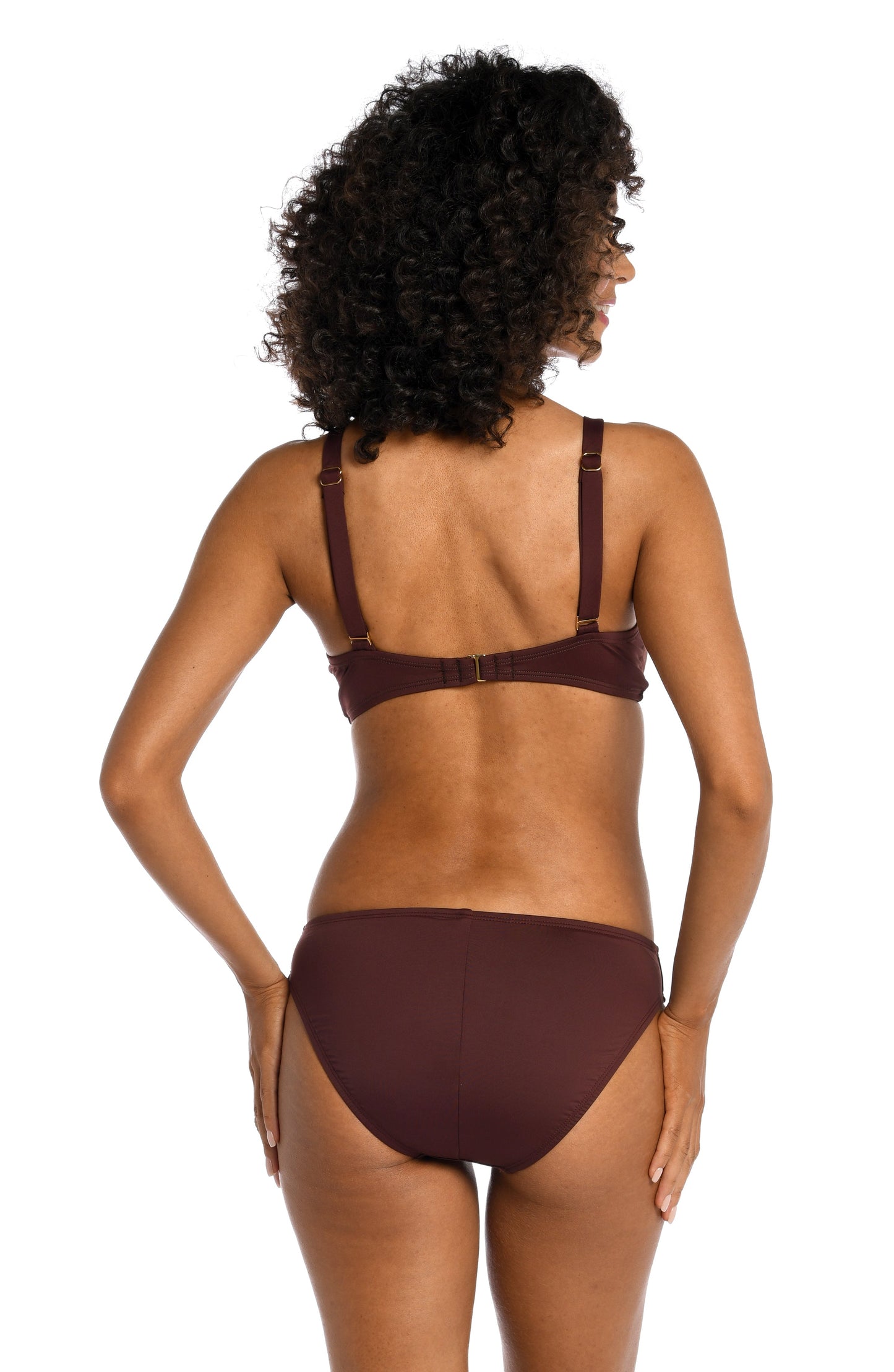 Model is wearing a solid brown colored twist front underwire bikini top from our Best-Selling Island Goddess collection.