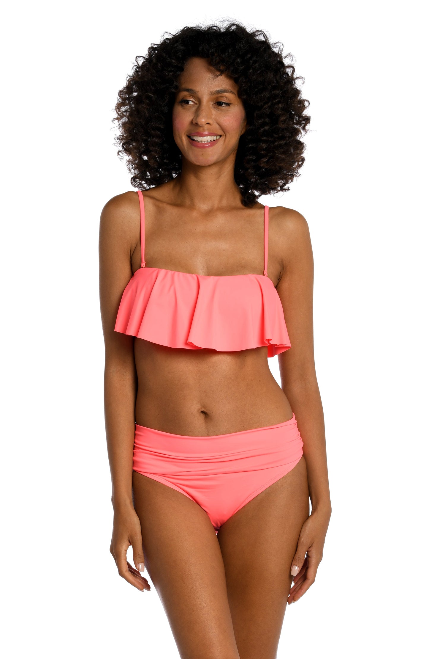 Model is wearing a hot coral colored ruffle bandeau swimsuit top from our Best-Selling Island Goddess collection.