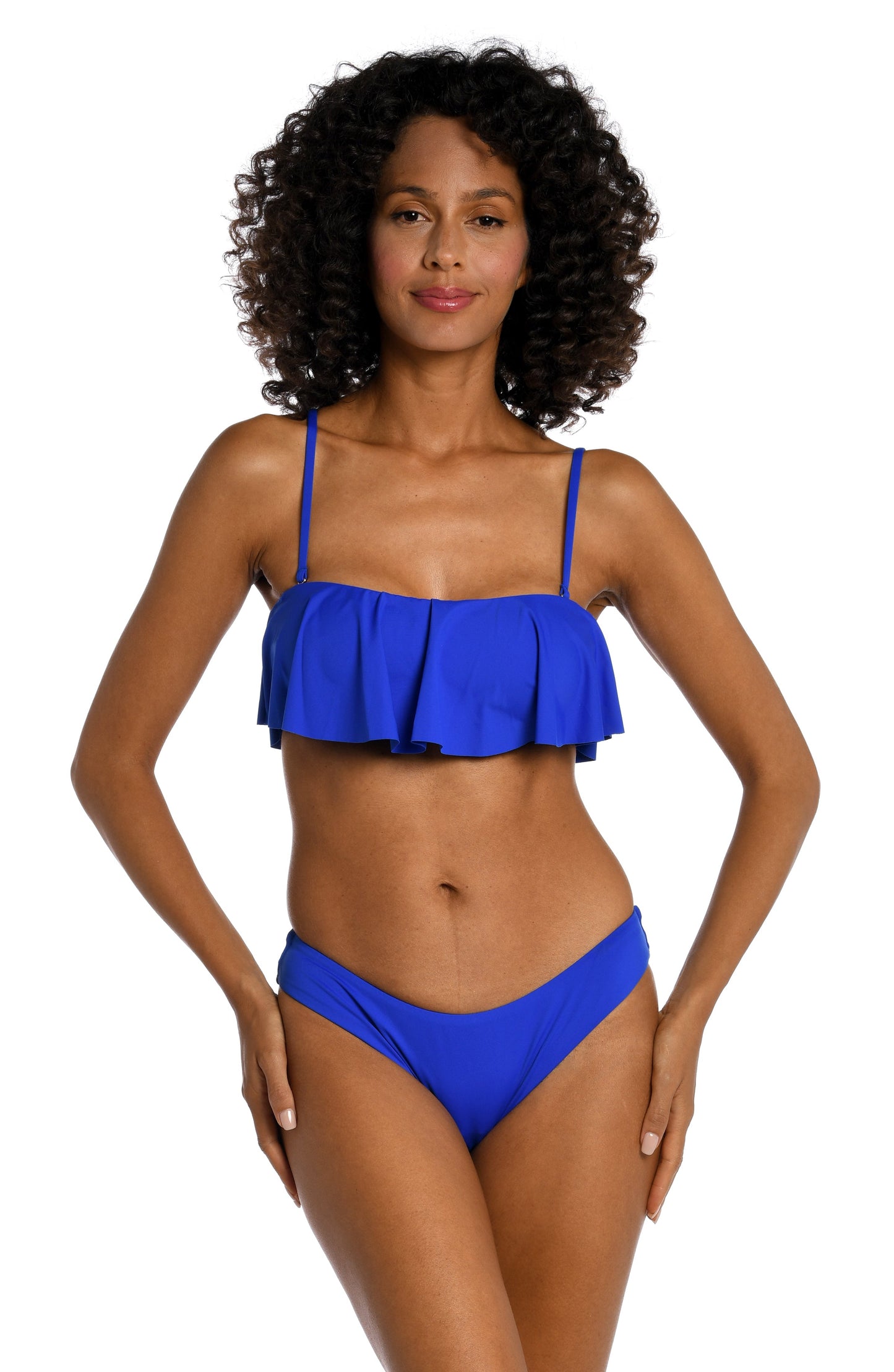 Model is wearing a sapphire colored ruffle bandeau swimsuit top from our Best-Selling Island Goddess collection.