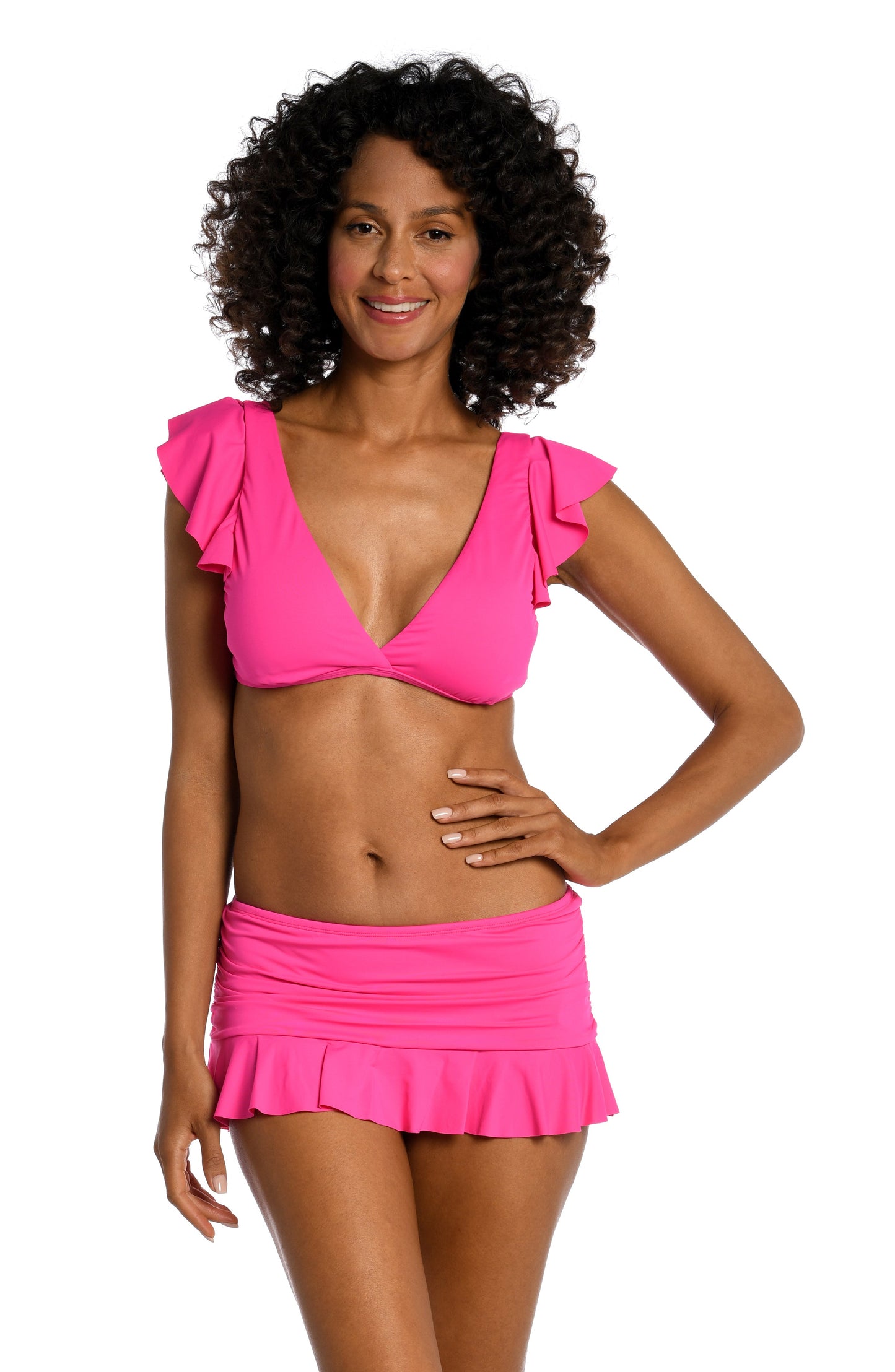 Model is wearing a pop pink colored ruffle sleeve swimsuit top from our Best-Selling Island Goddess collection.