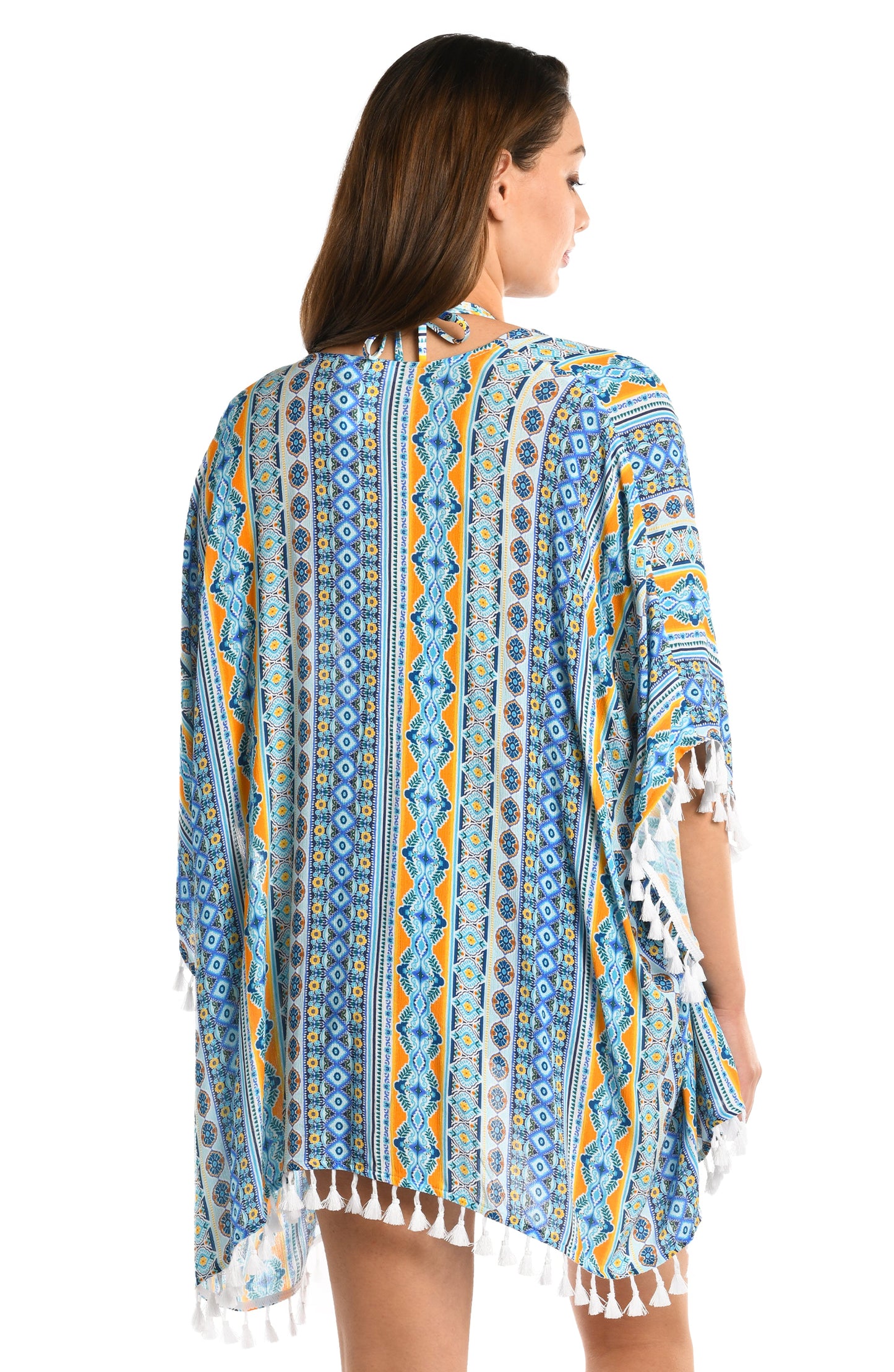 Model is wearing a blue multicolored mediterranean printed open front kimono cover up from our Scarf City collection.