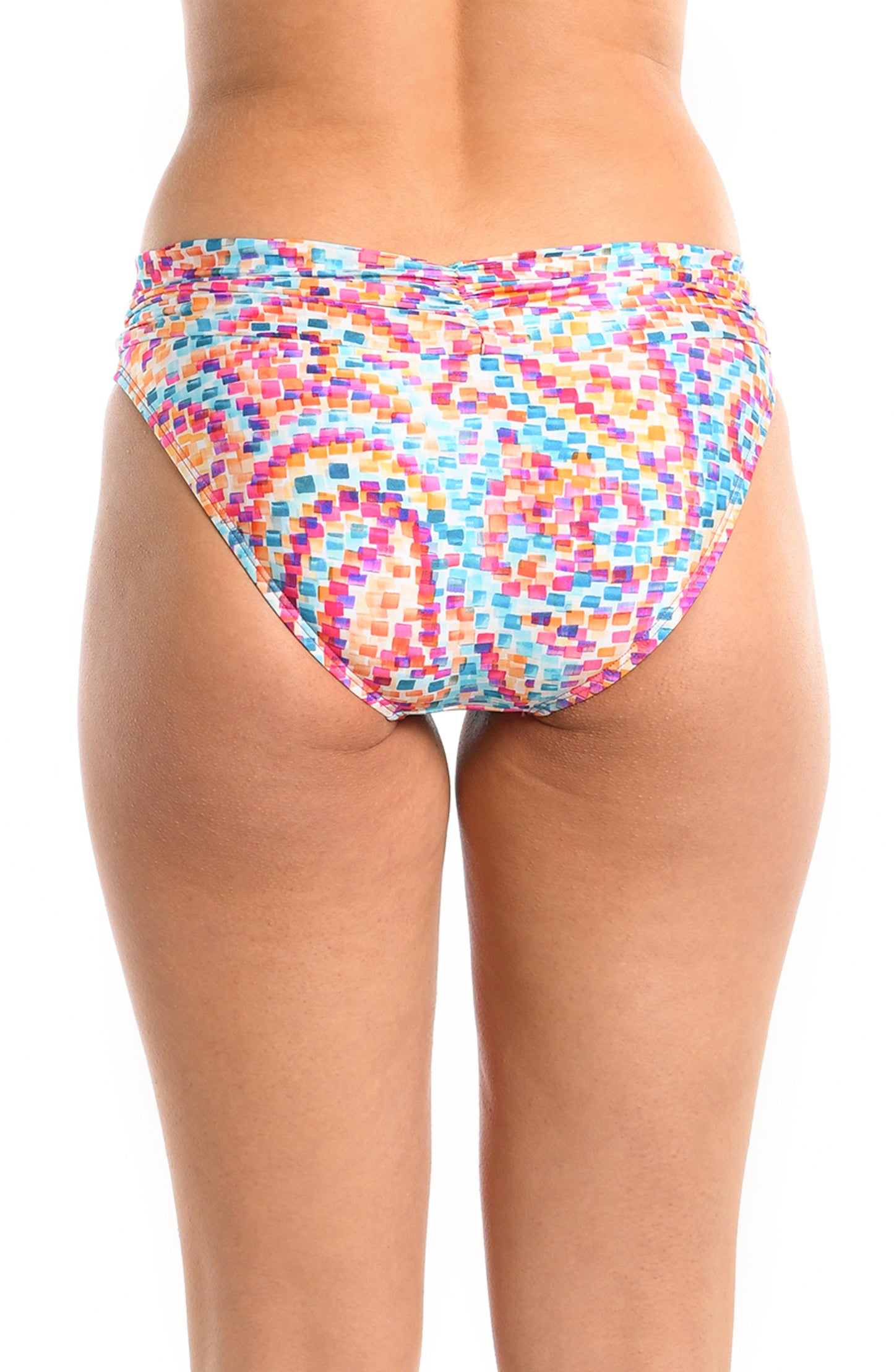 Model is wearing a pink multicolored paisley printed shirred band hipster bikini bottom from our Pebble Beach collection.