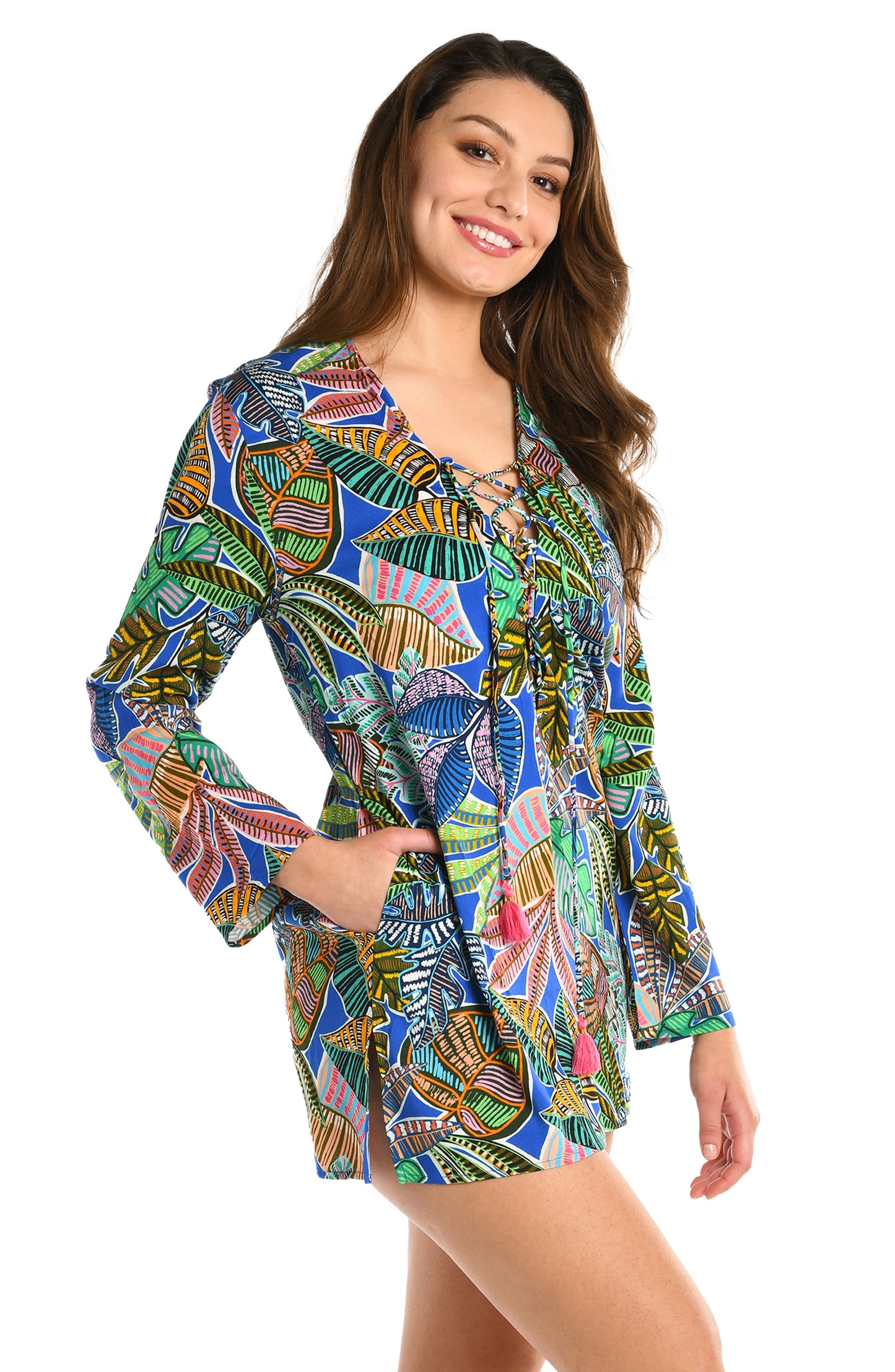 Model is wearing a neon colored printed tunic cover up from our Neon Nights collection!