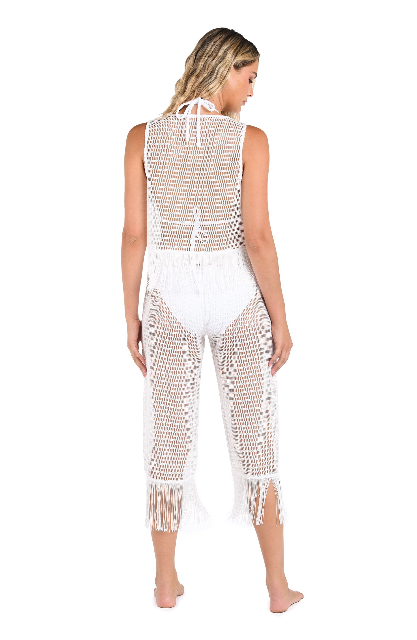 Model is wearing a Fringed Out Tank Top + Cropped Pant in White.