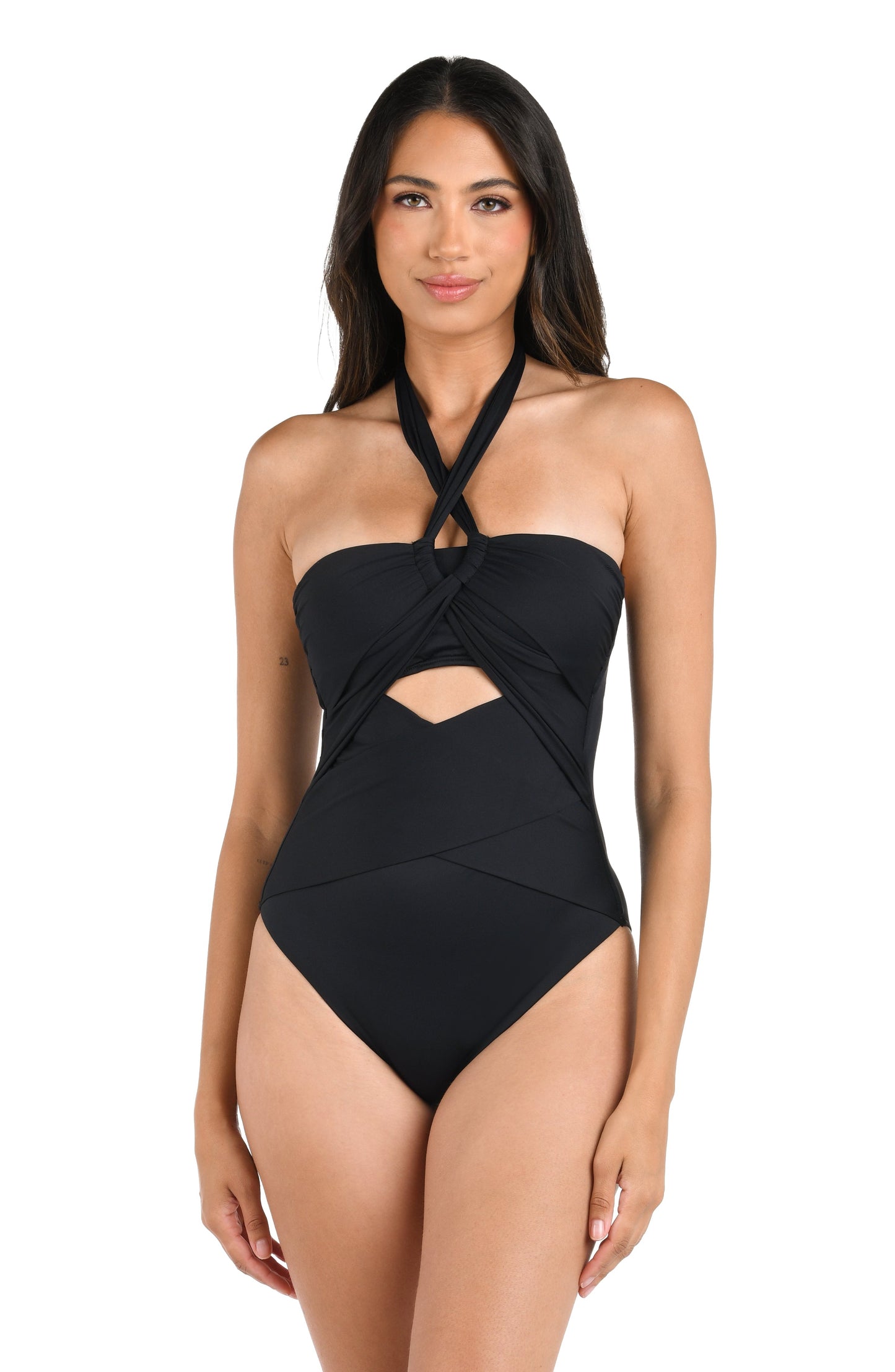 Model is wearing a solid black halter one piece swimsuit.