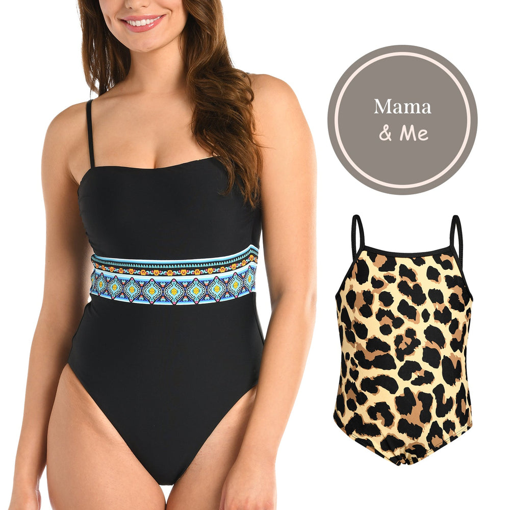 
                  
                    Toddler is wearing a black and tan leopard printed high neck one piece from our Mama and Me Running Wild collection.
                  
                