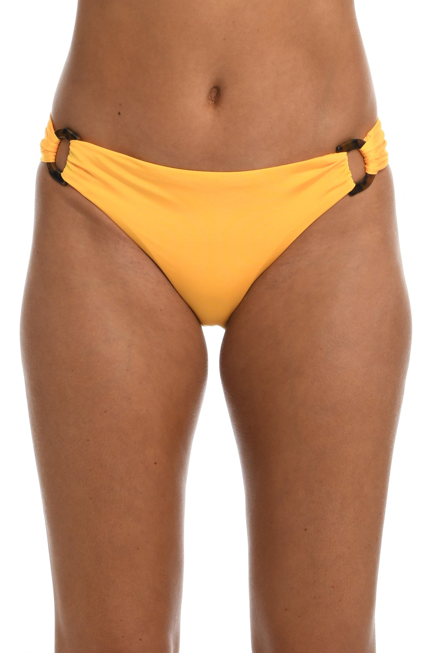 Model is wearing a solid sunshine yellow colored side tie hipster bikini bottom from our Wanderlust Solids collection.