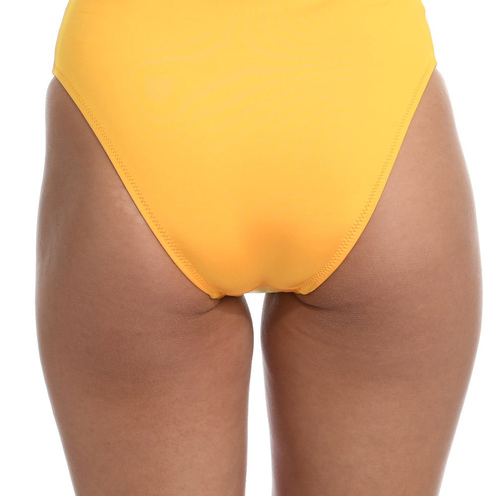 Model is wearing a solid sunshine yellow colored high waist bikini bottom from our Wanderlust Solids collection.