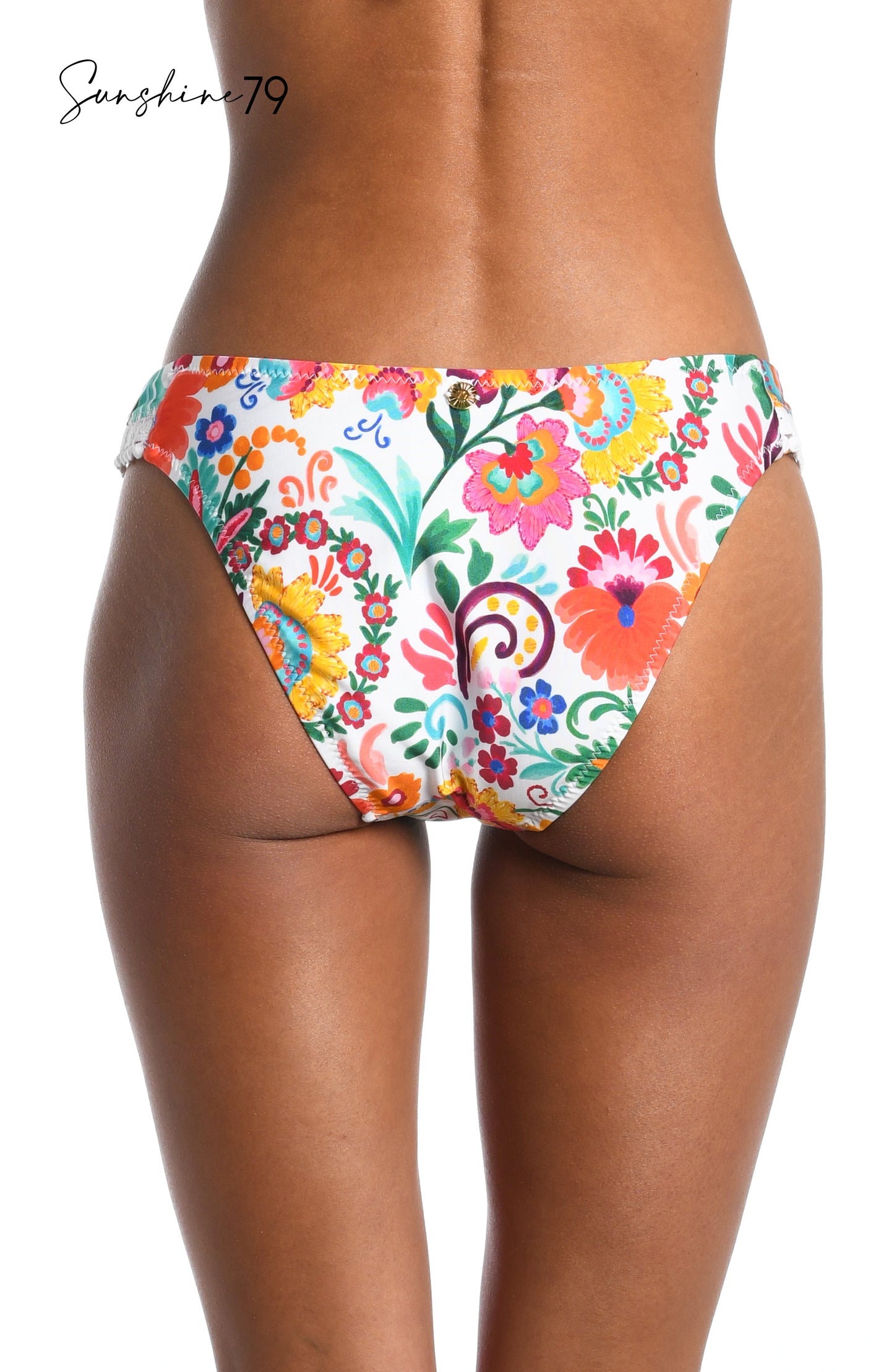 Model is wearing a multicolored spanish inspired printed french cut bikini bottom from our Sunshine 79 brand.