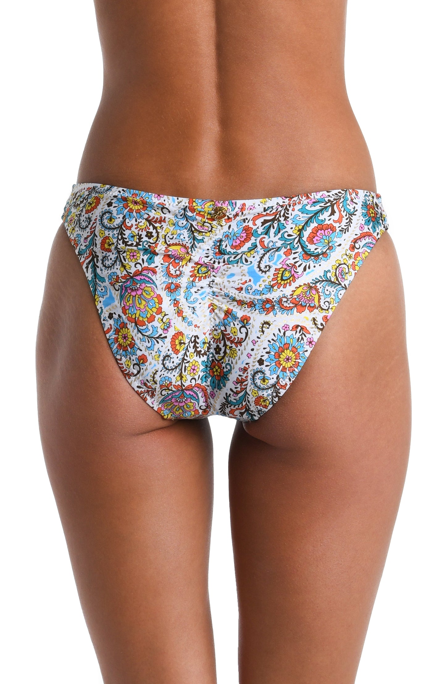 Model is wearing a white, red, blue, green, and yellow multicolored paisley printed French Cut Bikini Bottom