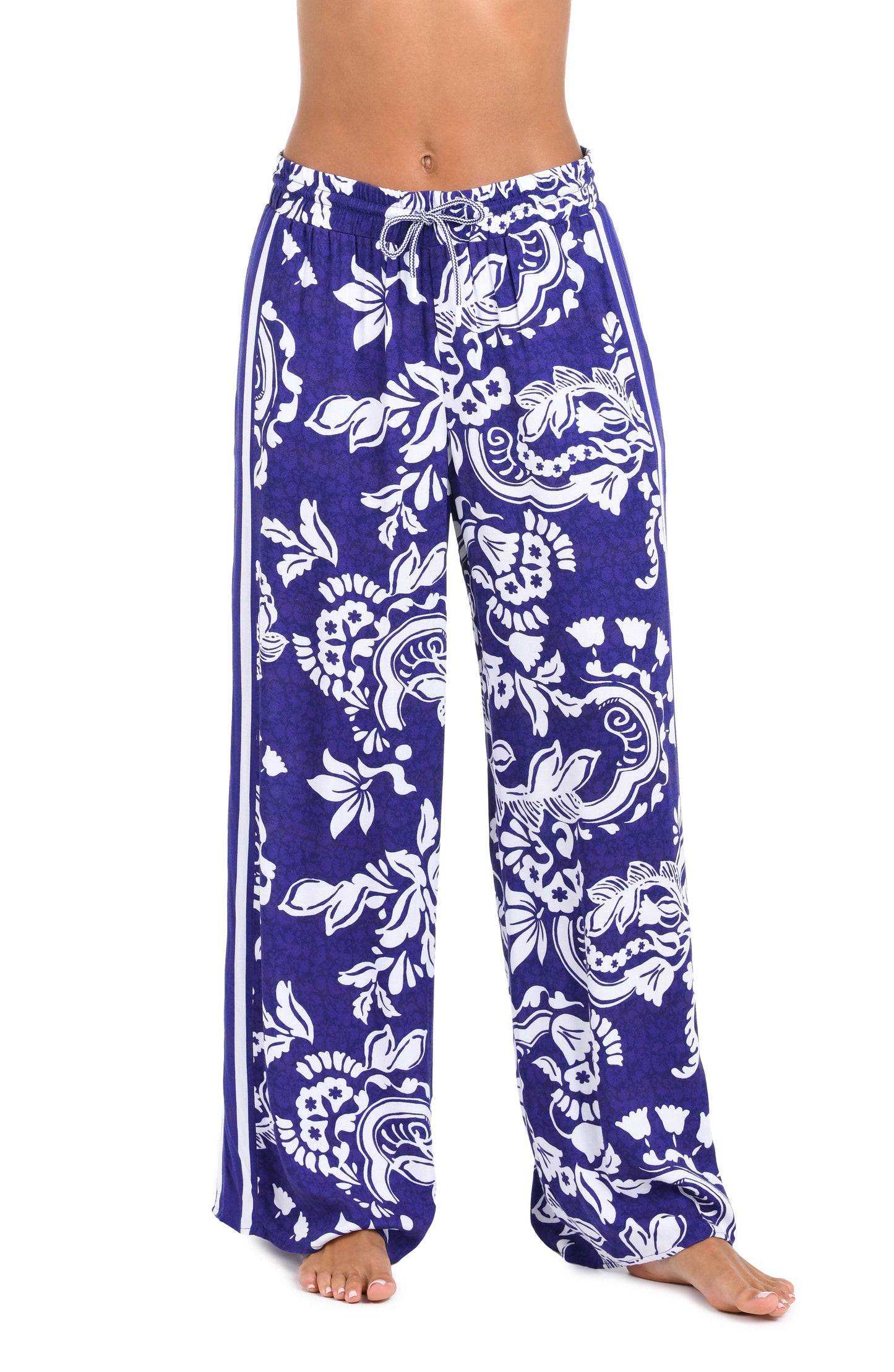 Front image of model wearing the Sunshine 79 Flower Trip Beach Pant.