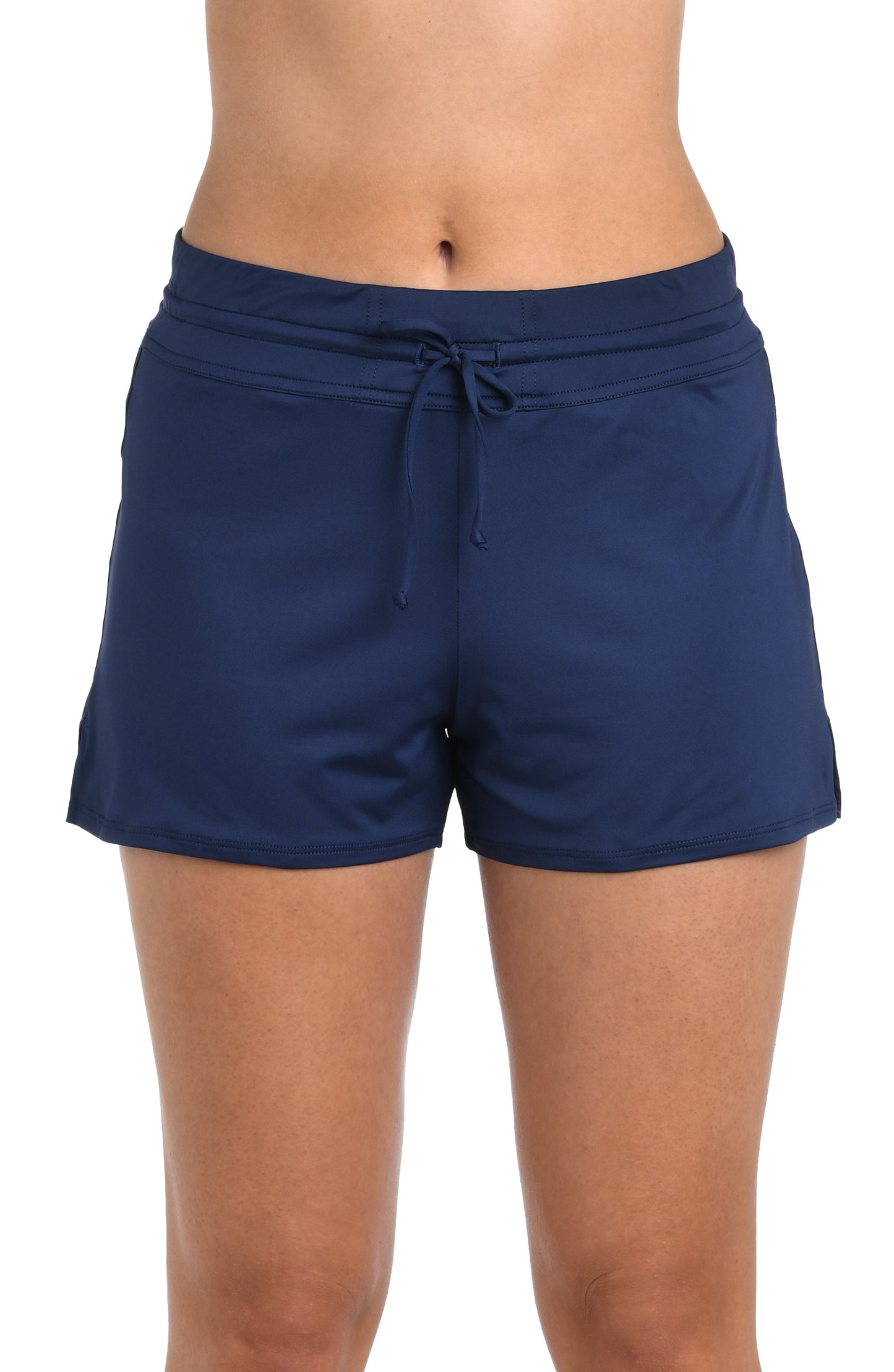 Front image of model wearing the 24th & Ocean Solid Front Tie Swim Short Bottom in Midnight.