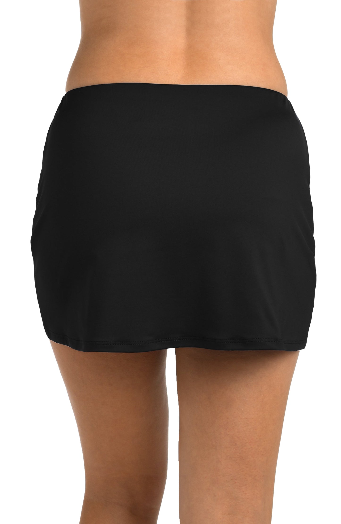 Back image of model wearing the 24th & Ocean Mid Rise Hem Skirt Bottom.