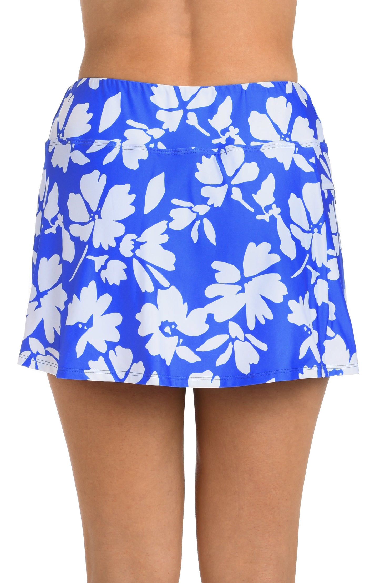 Back image of model wearing the 24th & Ocean Marseille Floral Swim Skort Bottom in Periwinkle.